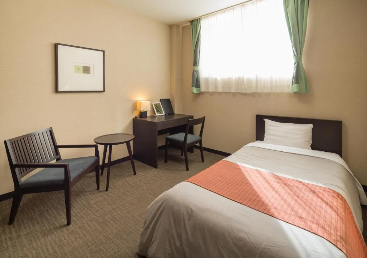 Bed in Kirishima Kanko Hotel