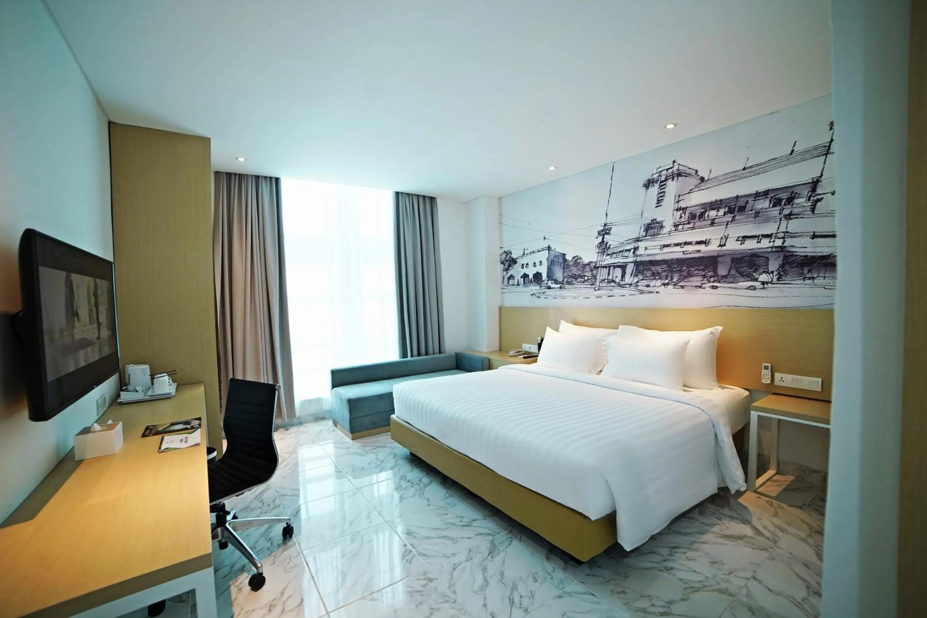 Bed in PALM PARK Hotel Surabaya