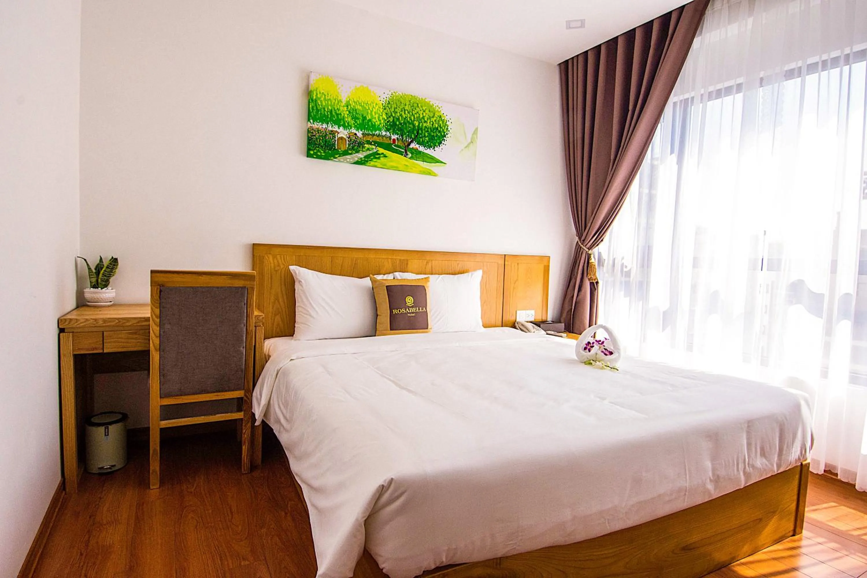 Bed in Rosabella Boutique Hotel