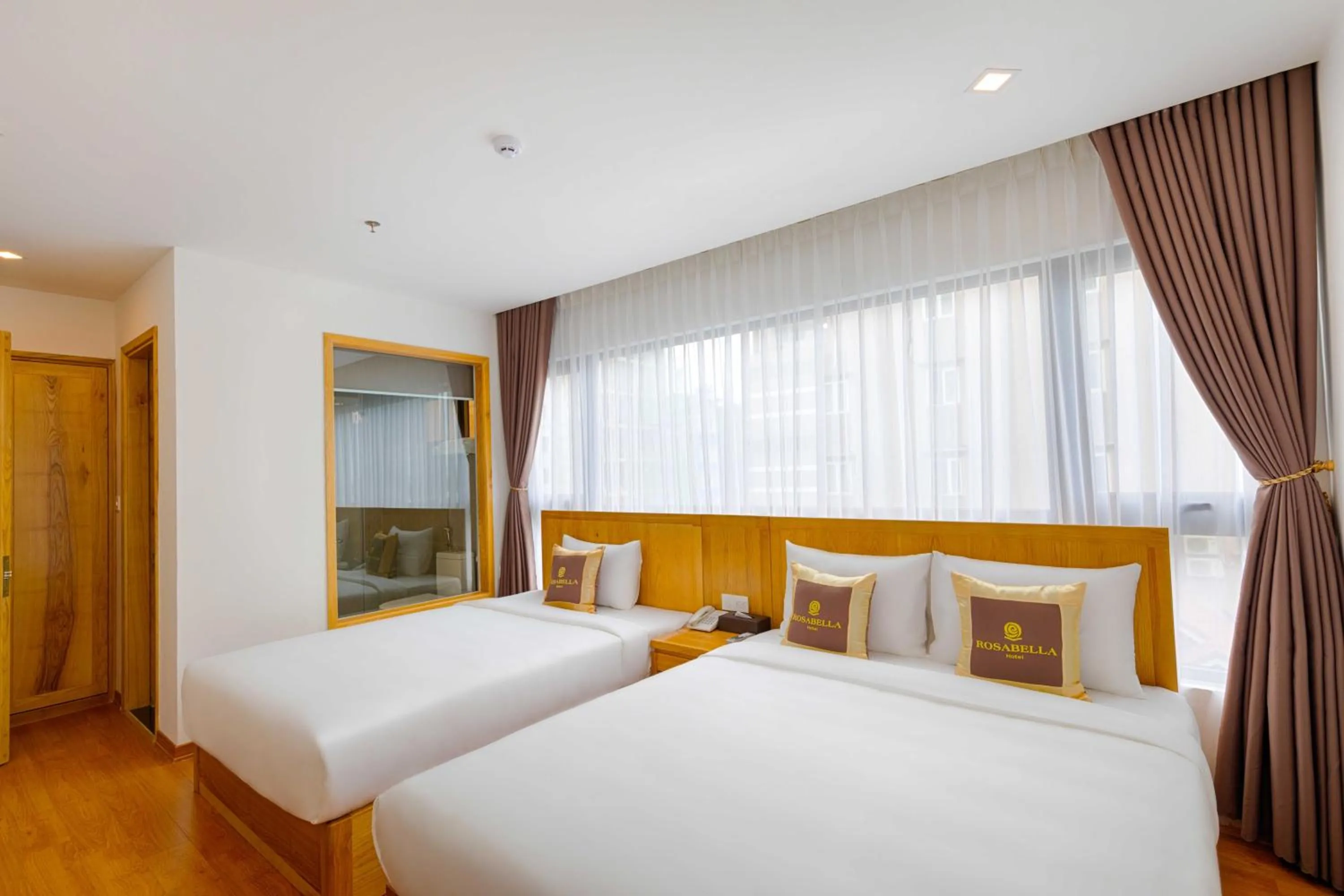 Bed in Rosabella Boutique Hotel