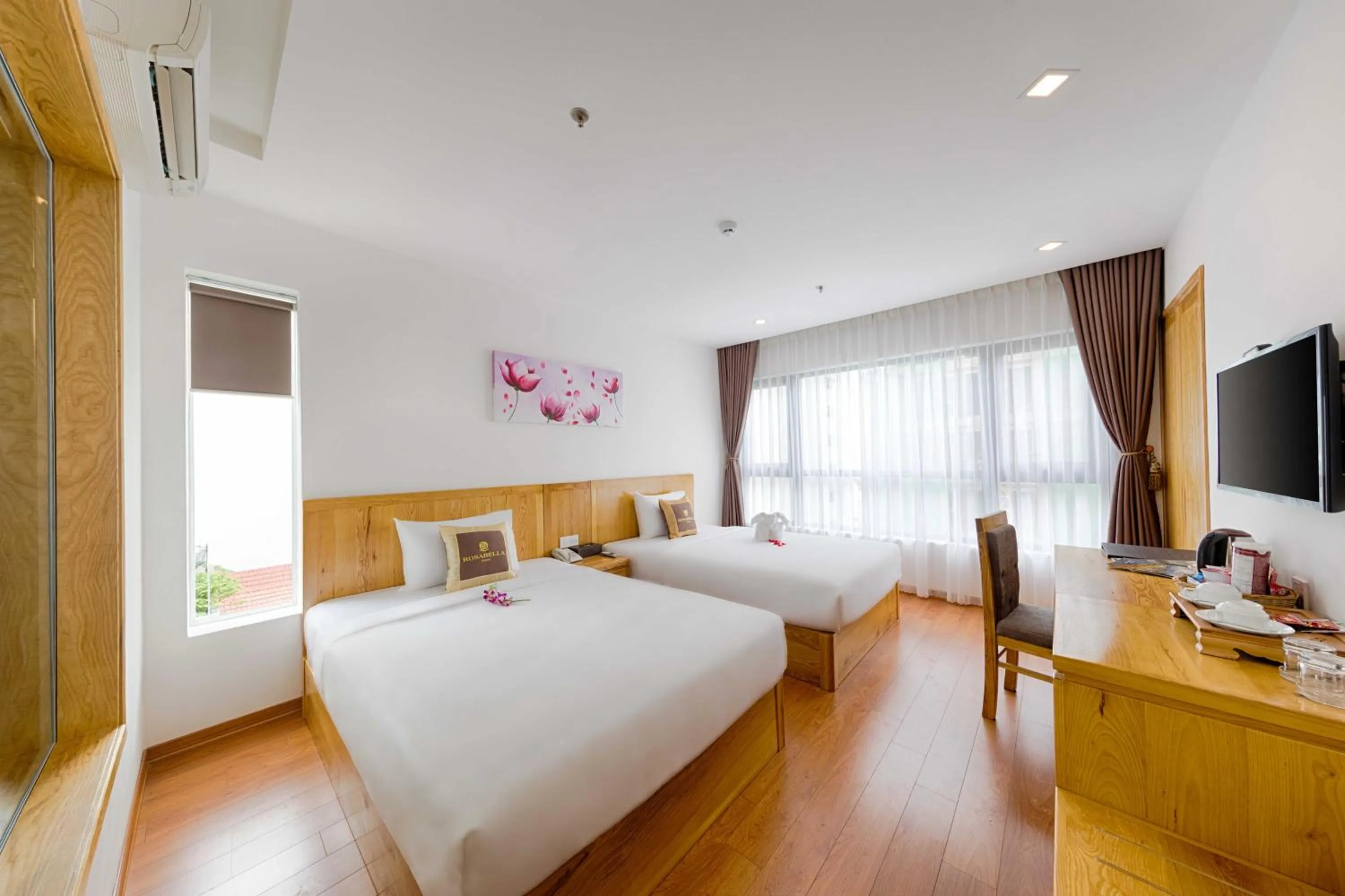 Bed in Rosabella Boutique Hotel