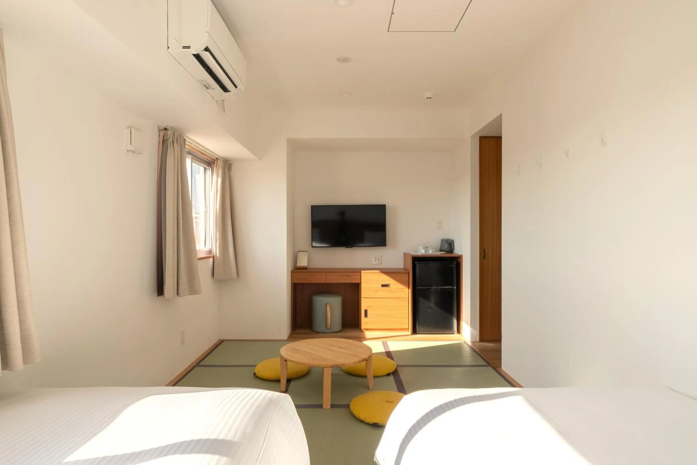 Bed in Smile Hotel Miyakojima