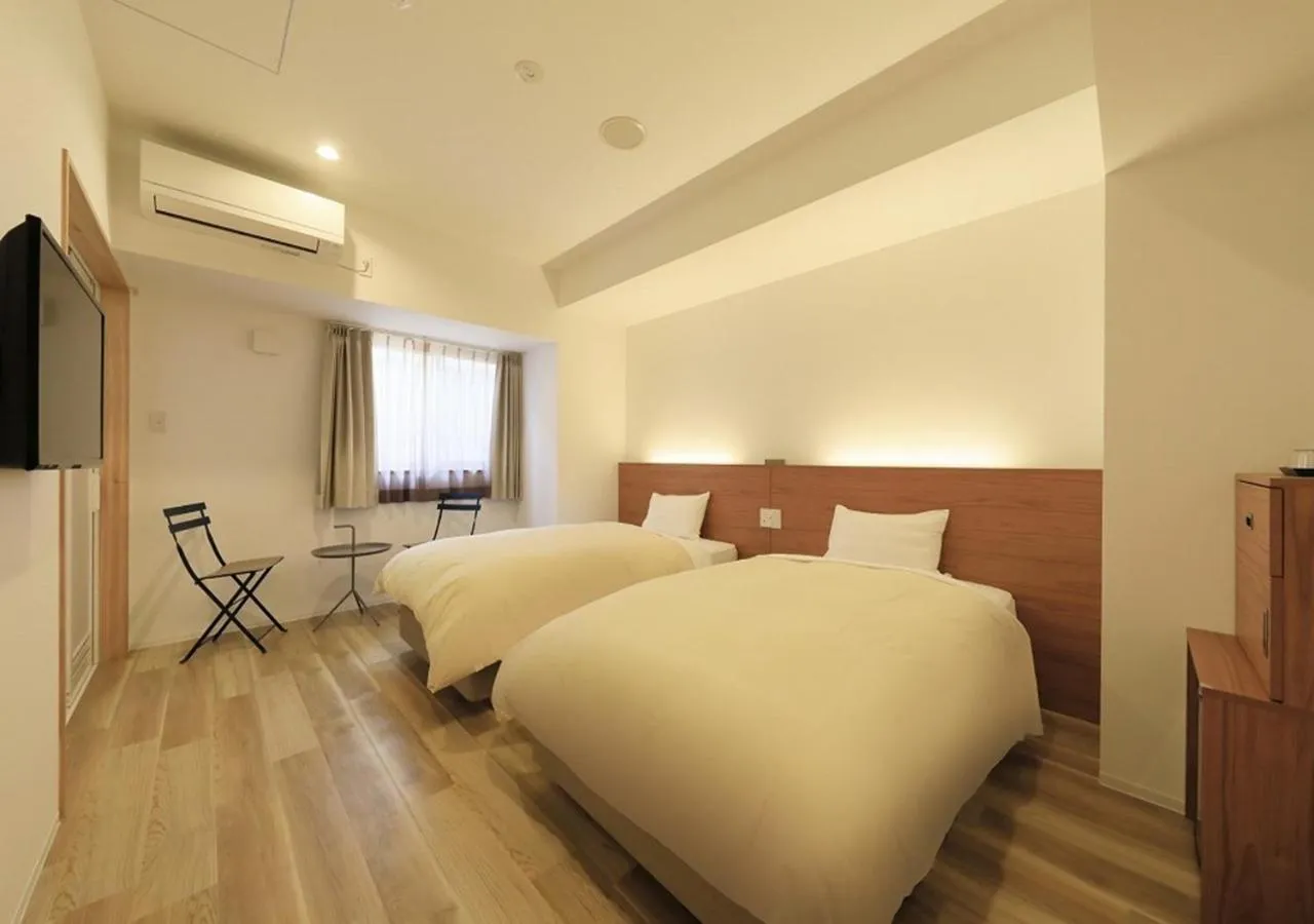 Photo of the whole room, Bed in Smile Hotel Miyakojima