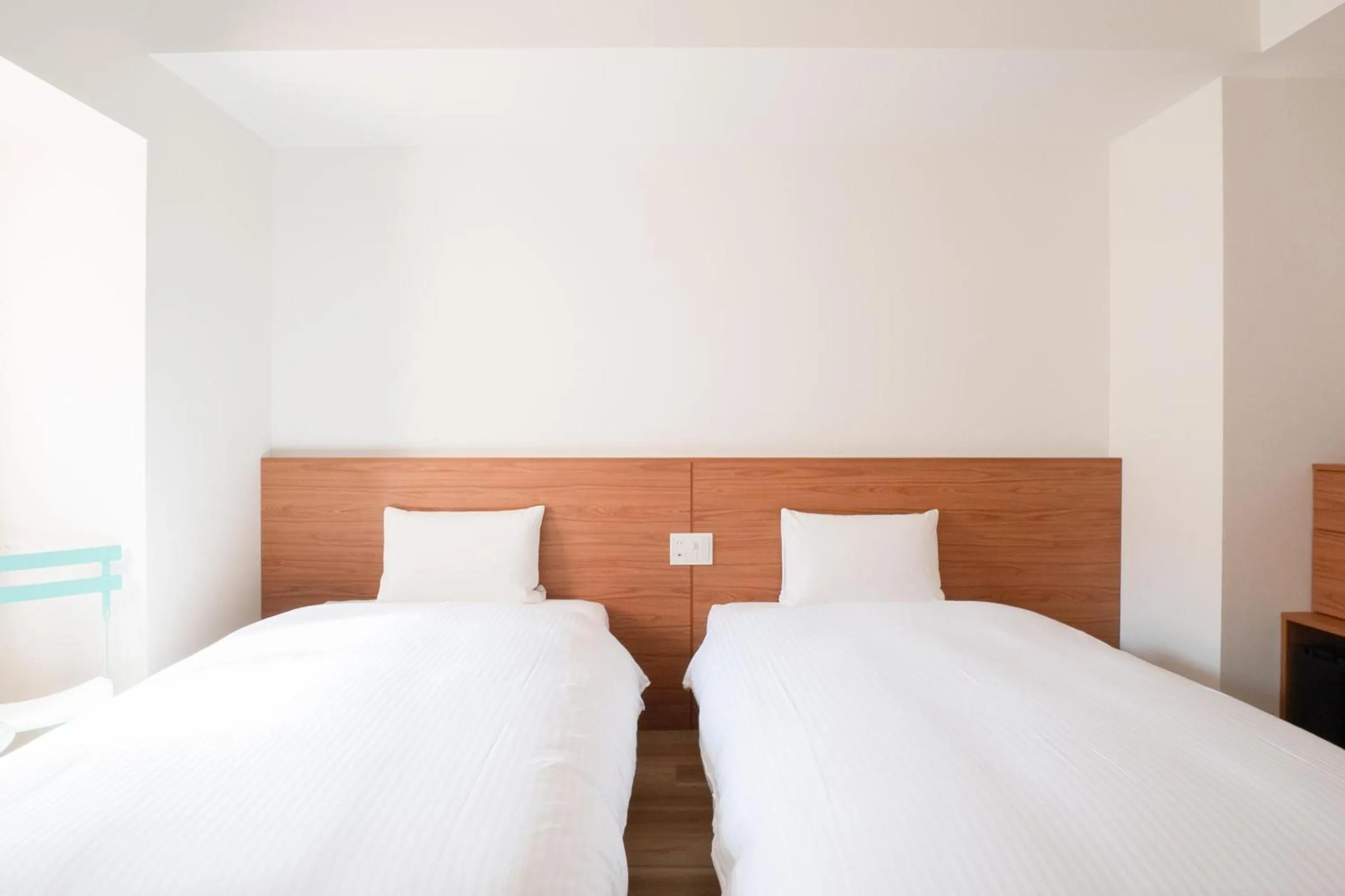 Photo of the whole room, Bed in Smile Hotel Miyakojima