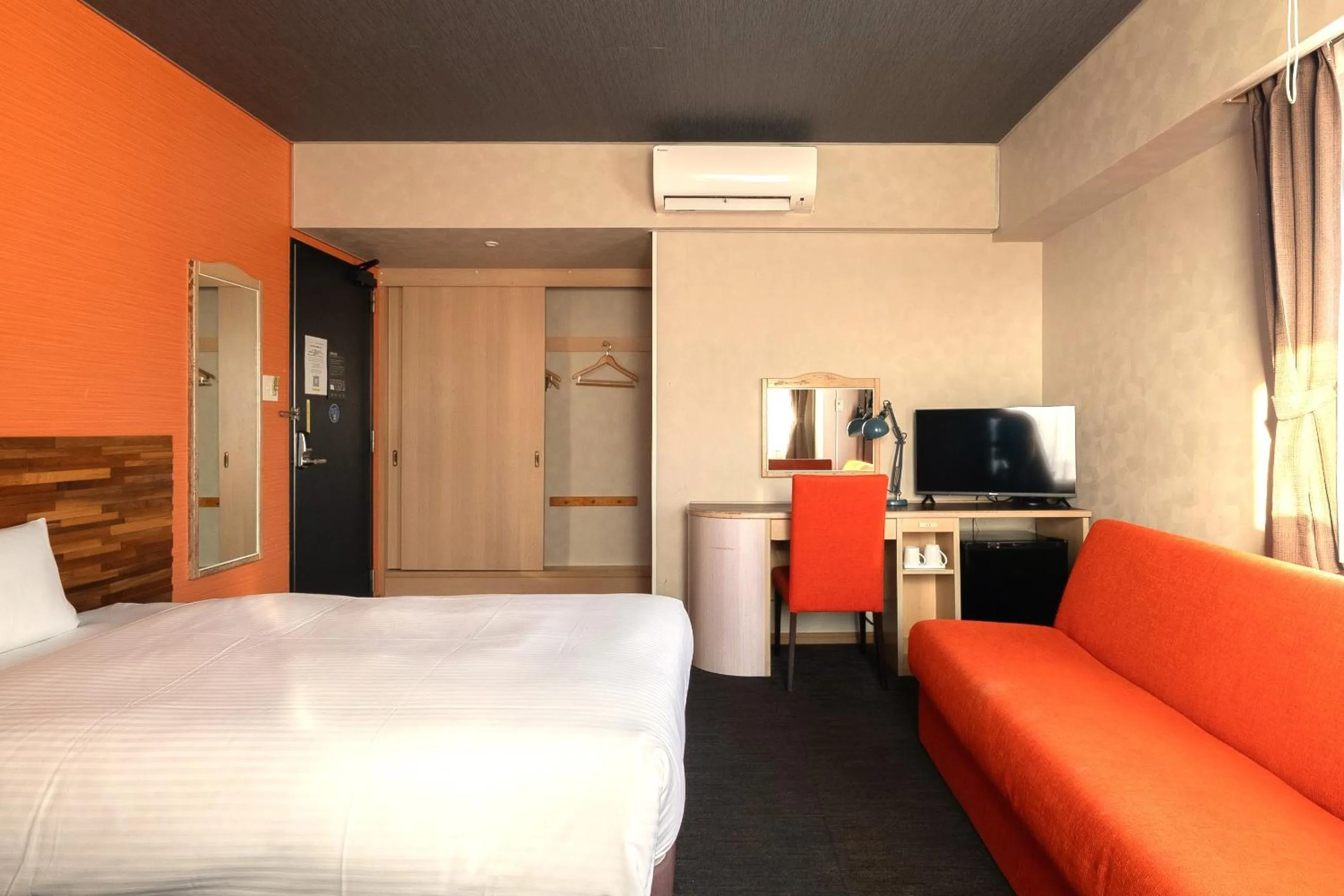 Bed in Smile Hotel Miyakojima