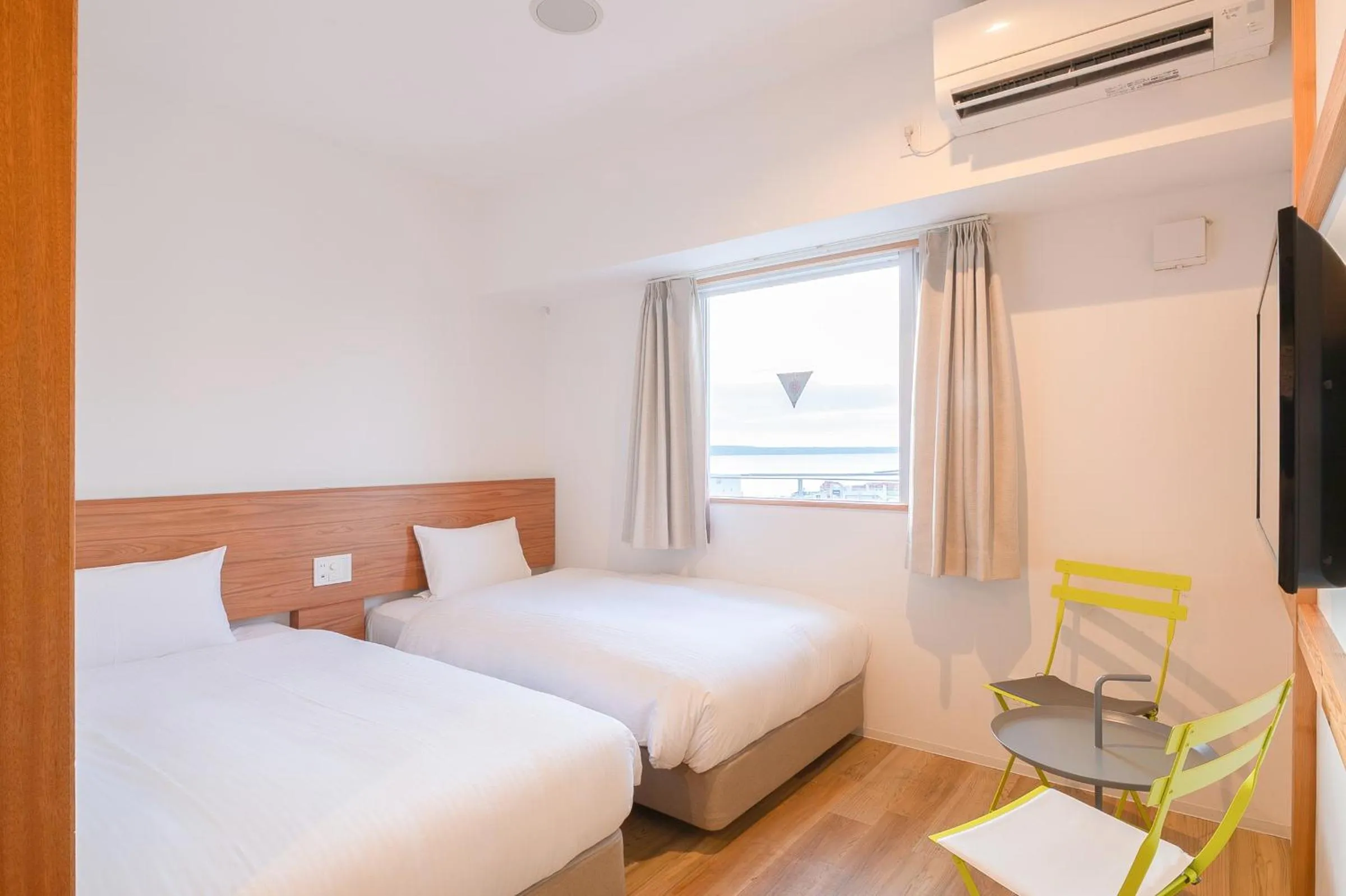 Photo of the whole room, Bed in Smile Hotel Miyakojima