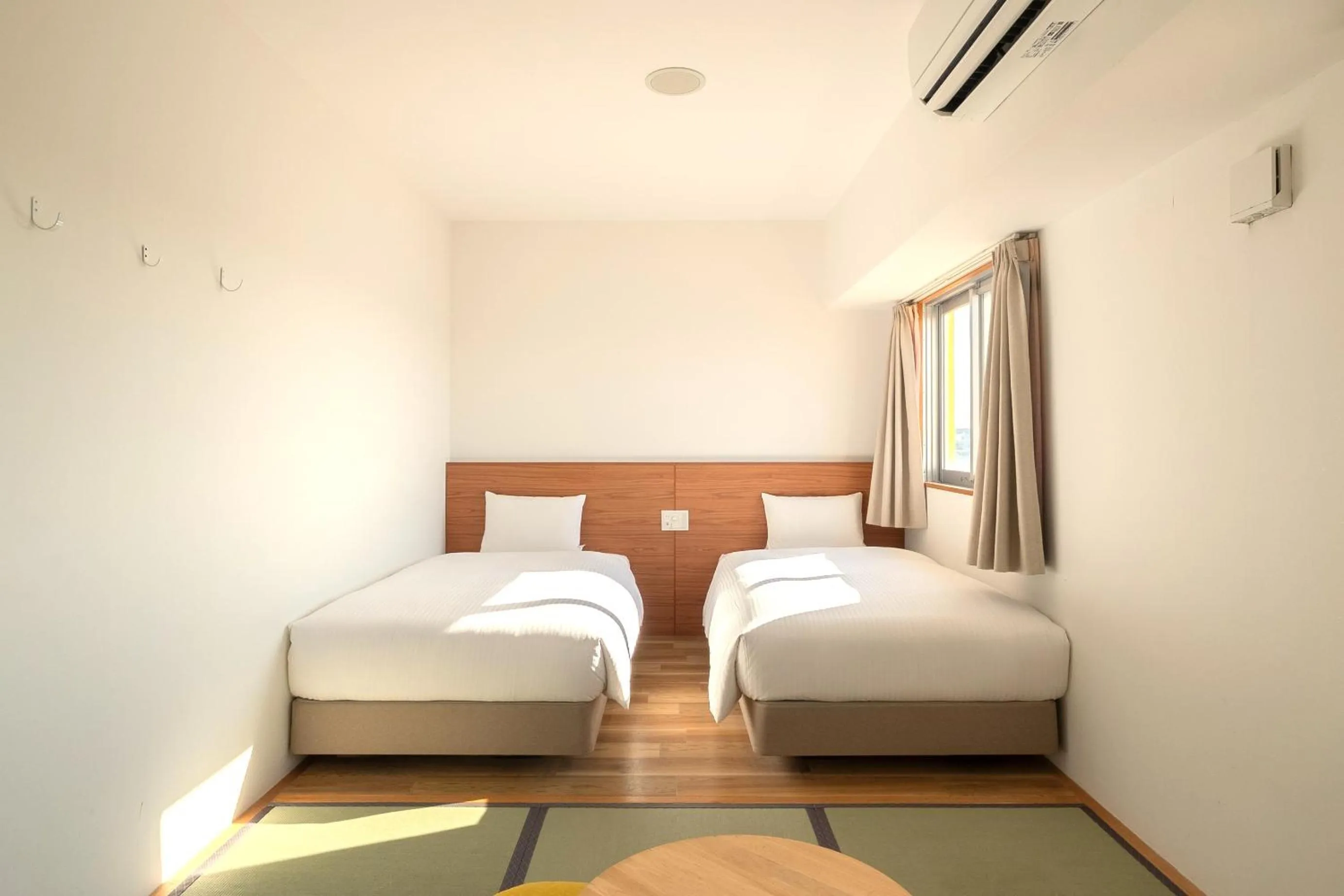 Bed in Smile Hotel Miyakojima