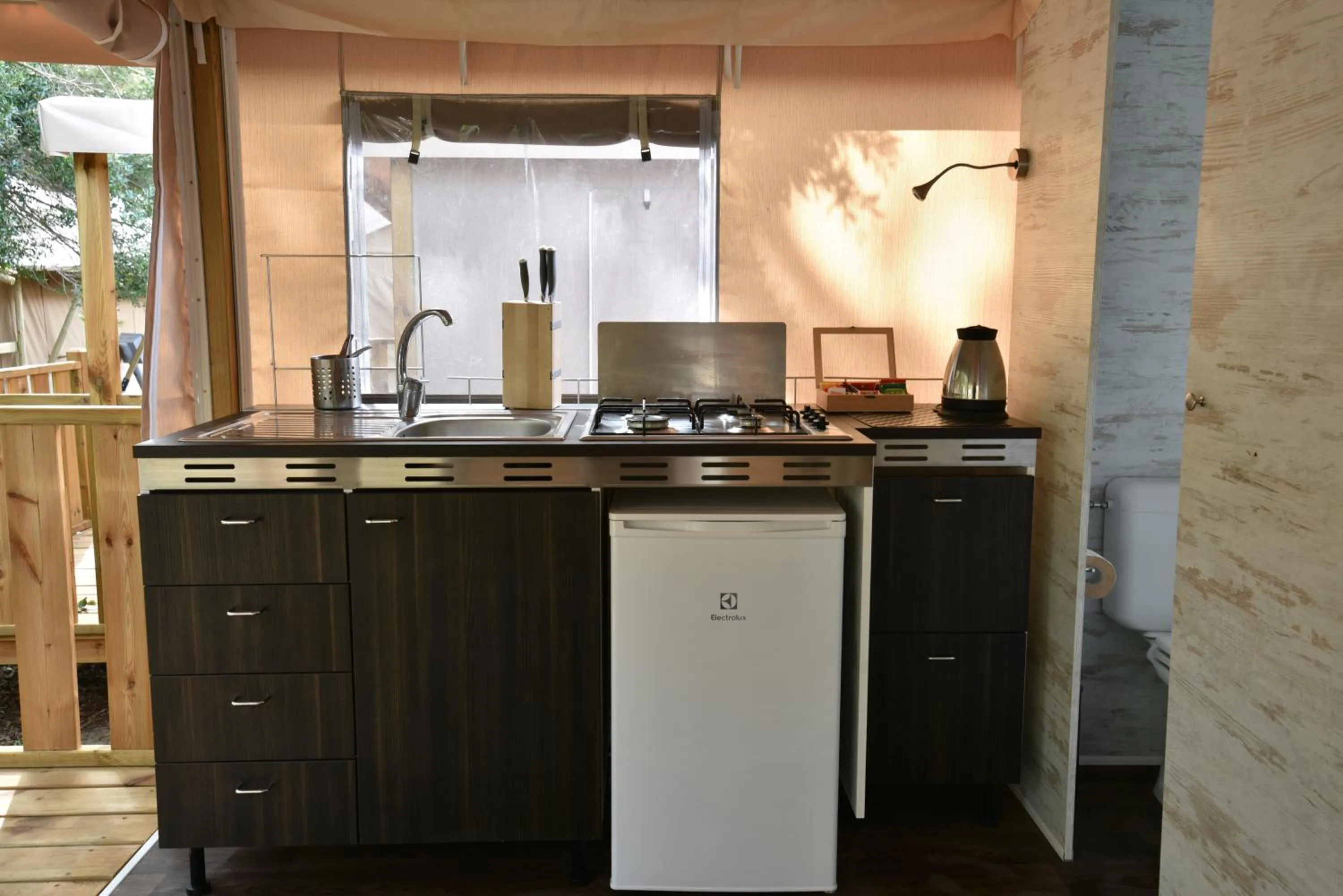 Kitchen or kitchenette in Camping Maremma Sans Souci