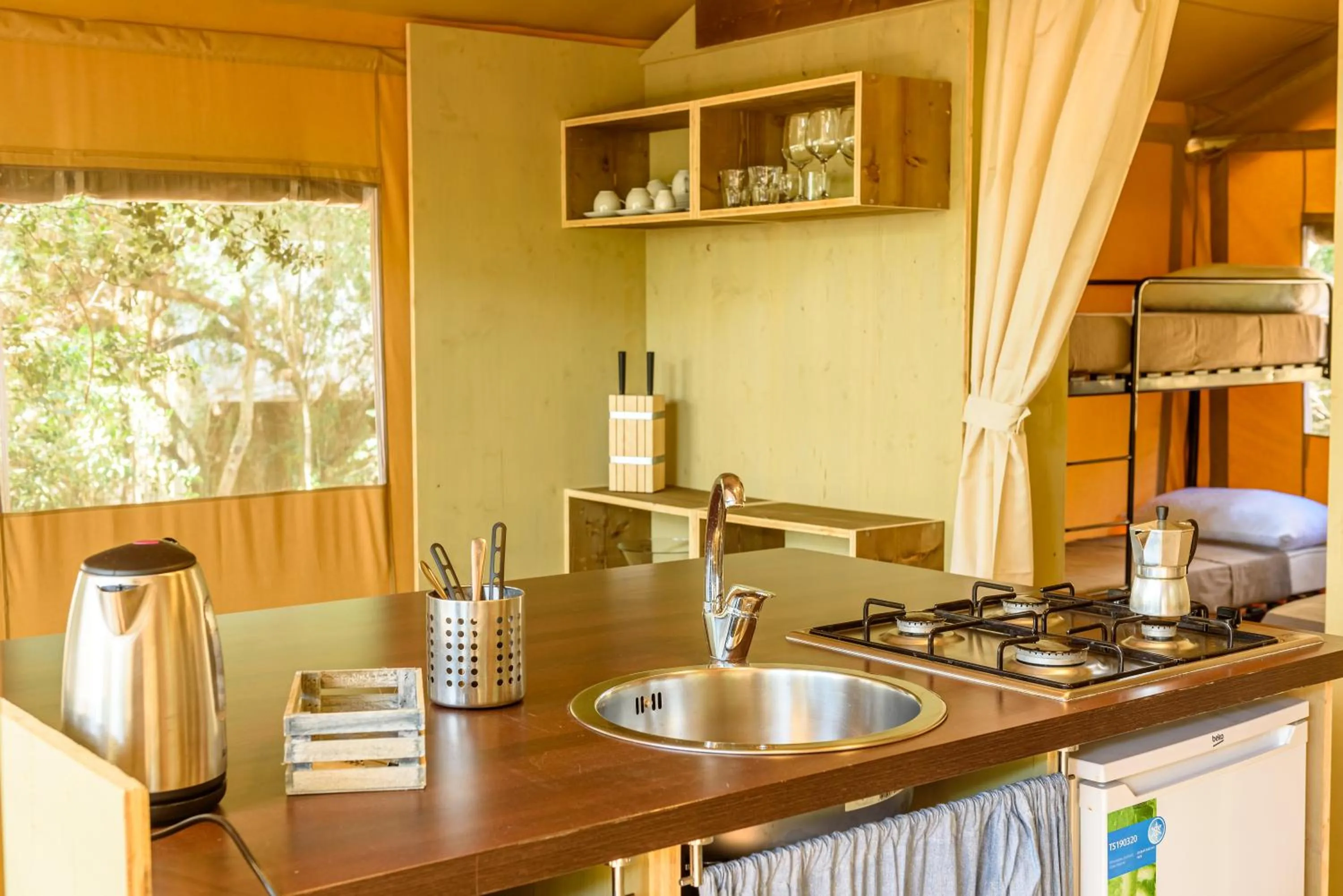 Kitchen or kitchenette in Camping Maremma Sans Souci