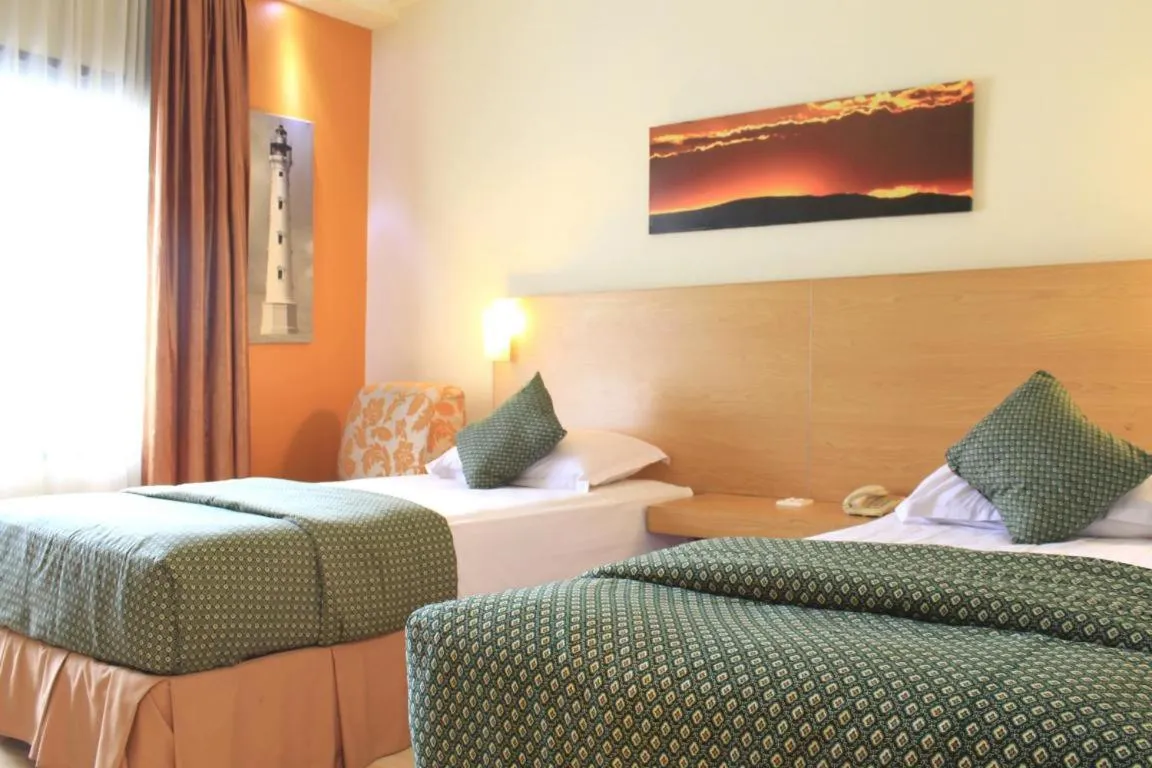 Bedroom, Bed in Lux Tychi Hotel