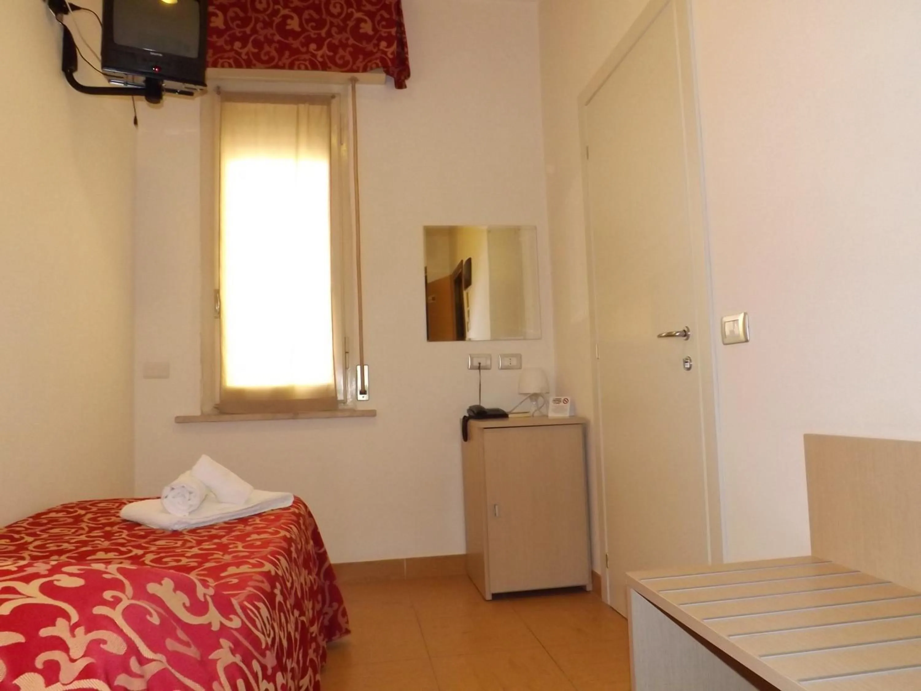 Bedroom in Hotel Mimosa