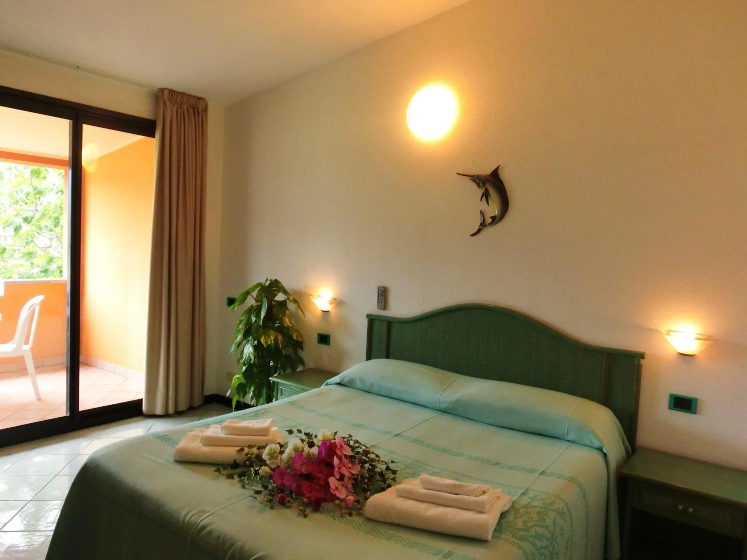 Bed in Hotel Blu Marlin