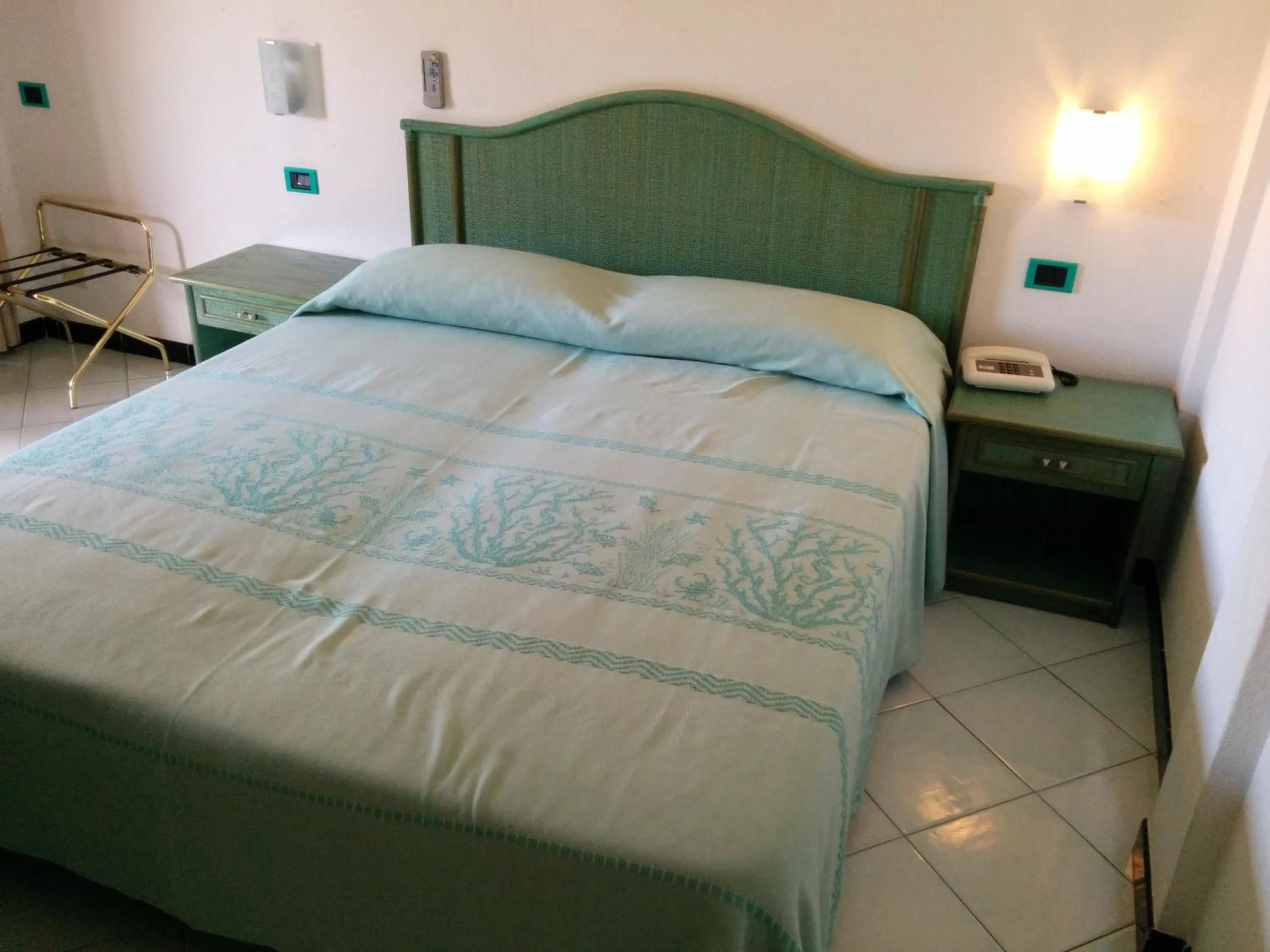 Bed in Hotel Blu Marlin