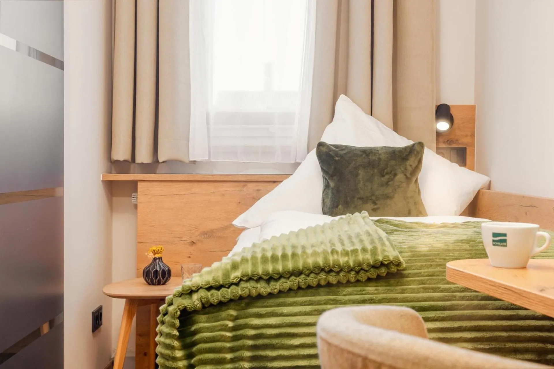 Photo of the whole room, Bed in Hotel Schlossblick Chiemsee