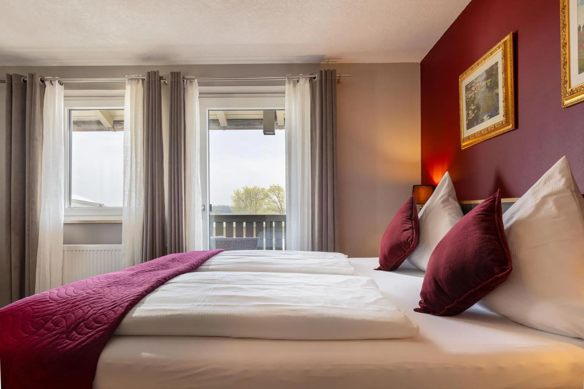 Photo of the whole room, Bed in Hotel Schlossblick Chiemsee