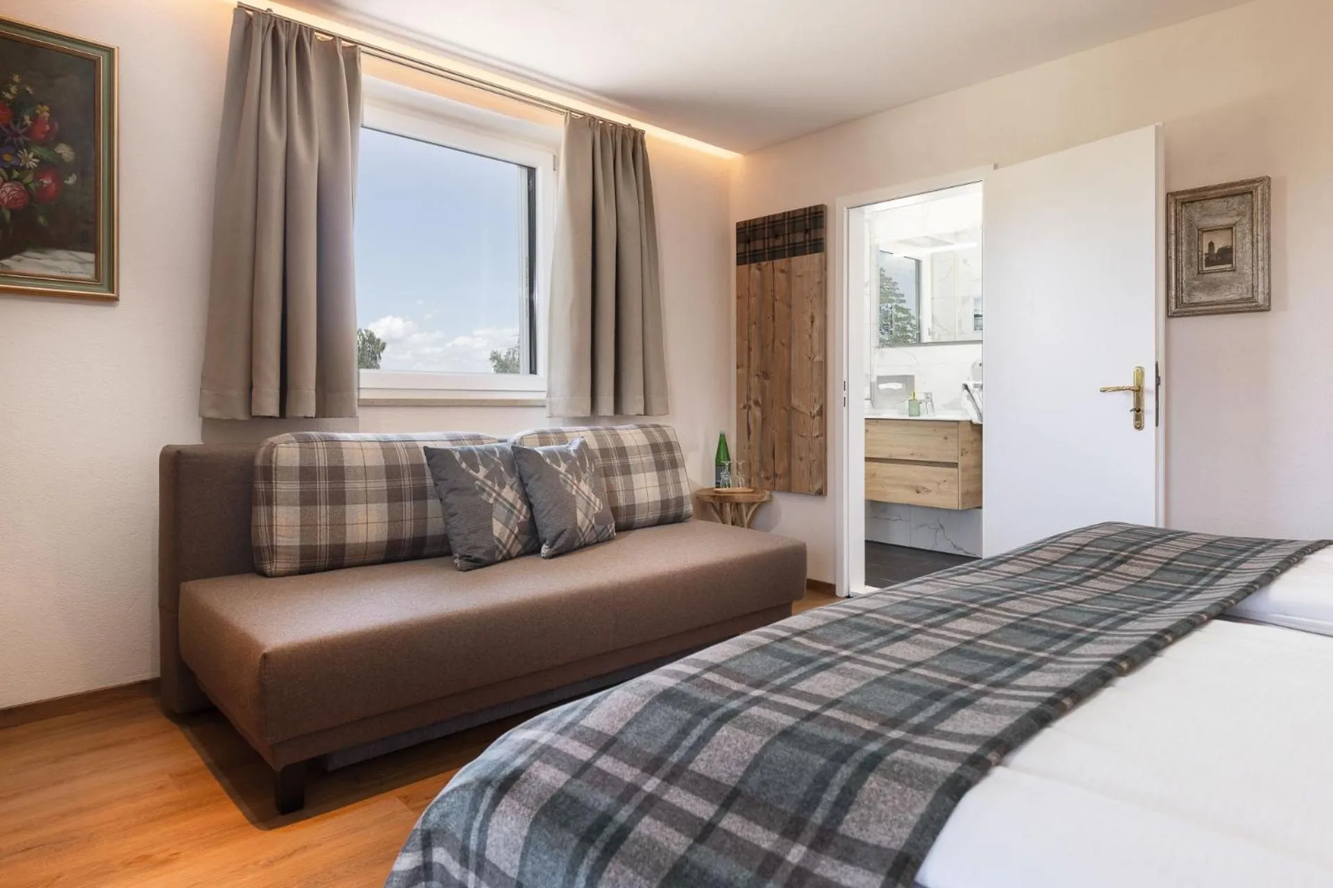 Photo of the whole room, Bed in Hotel Schlossblick Chiemsee