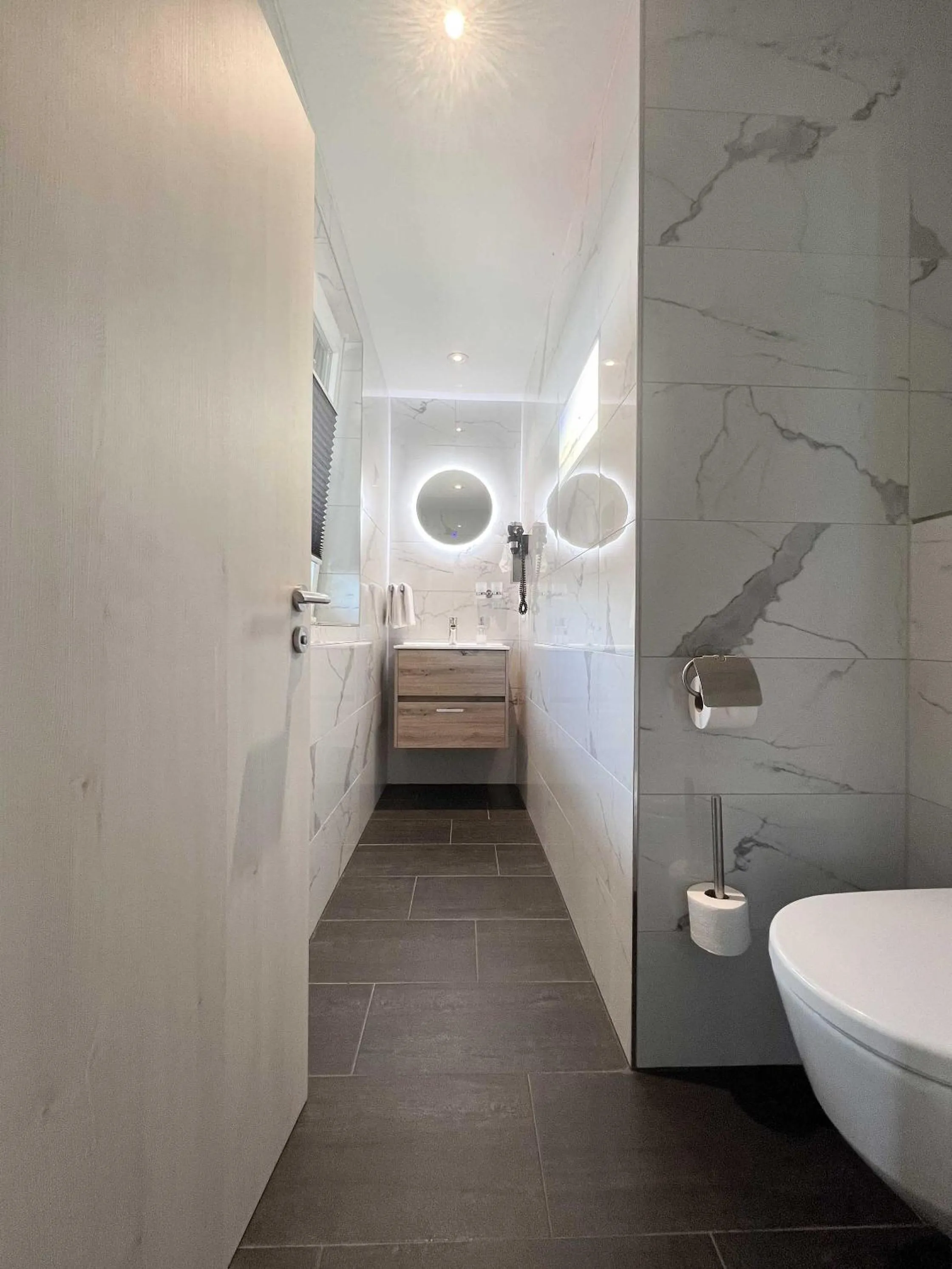 Bathroom, Bed in Hotel Schlossblick Chiemsee