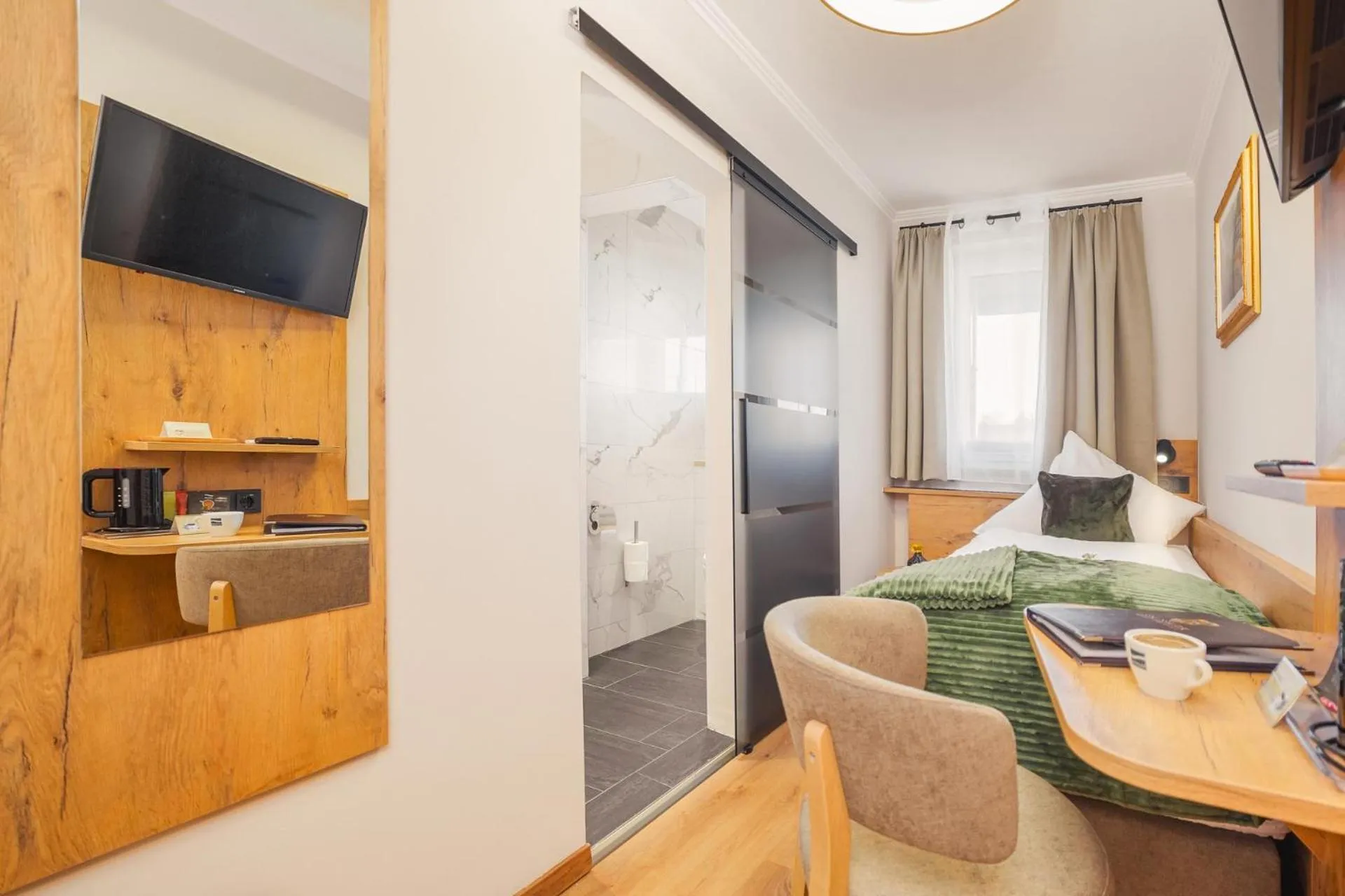 Photo of the whole room, Bed in Hotel Schlossblick Chiemsee