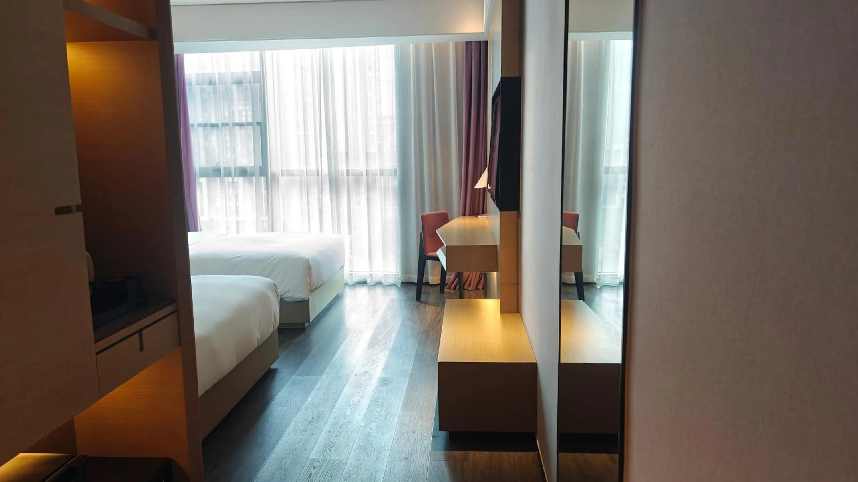 Bed in Mercure Suzhou Downtown