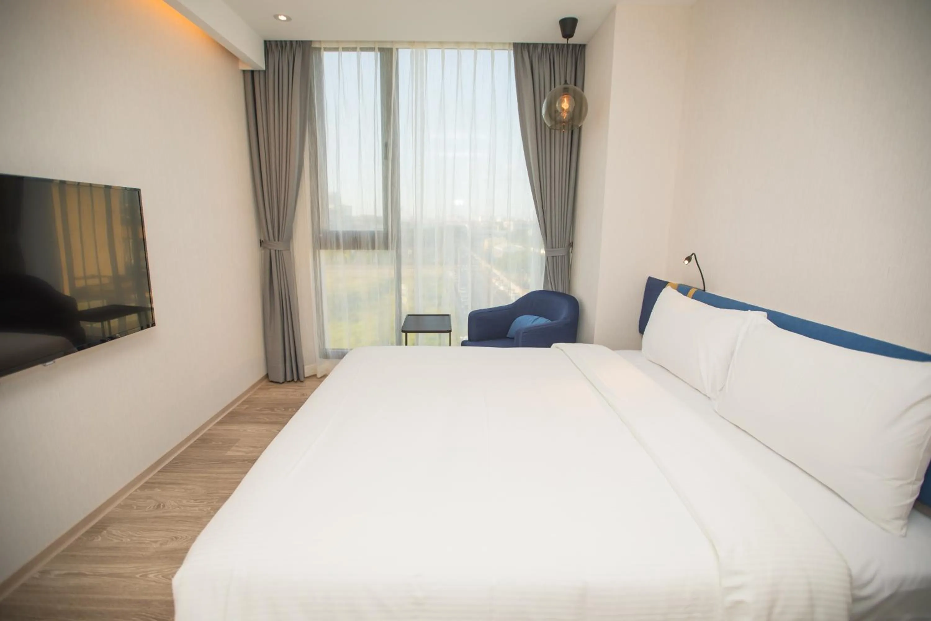 Bed in Explore Hotel