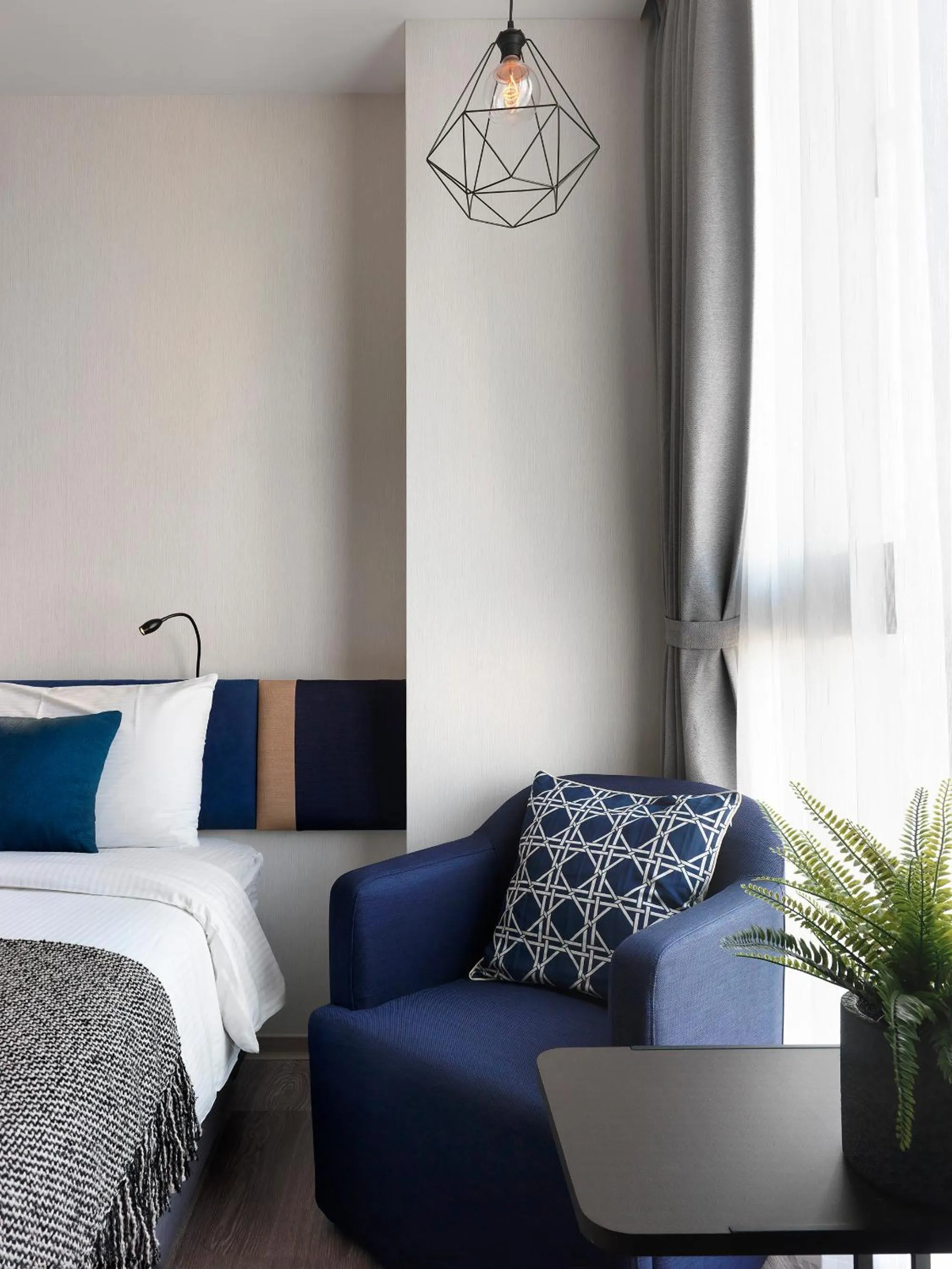 Bed in Explore Hotel