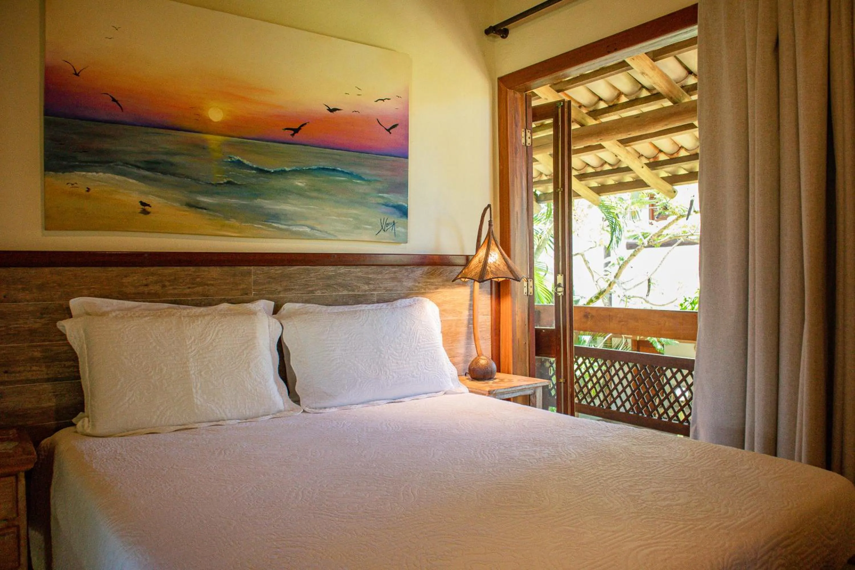 Bed in Pousada Barrabella