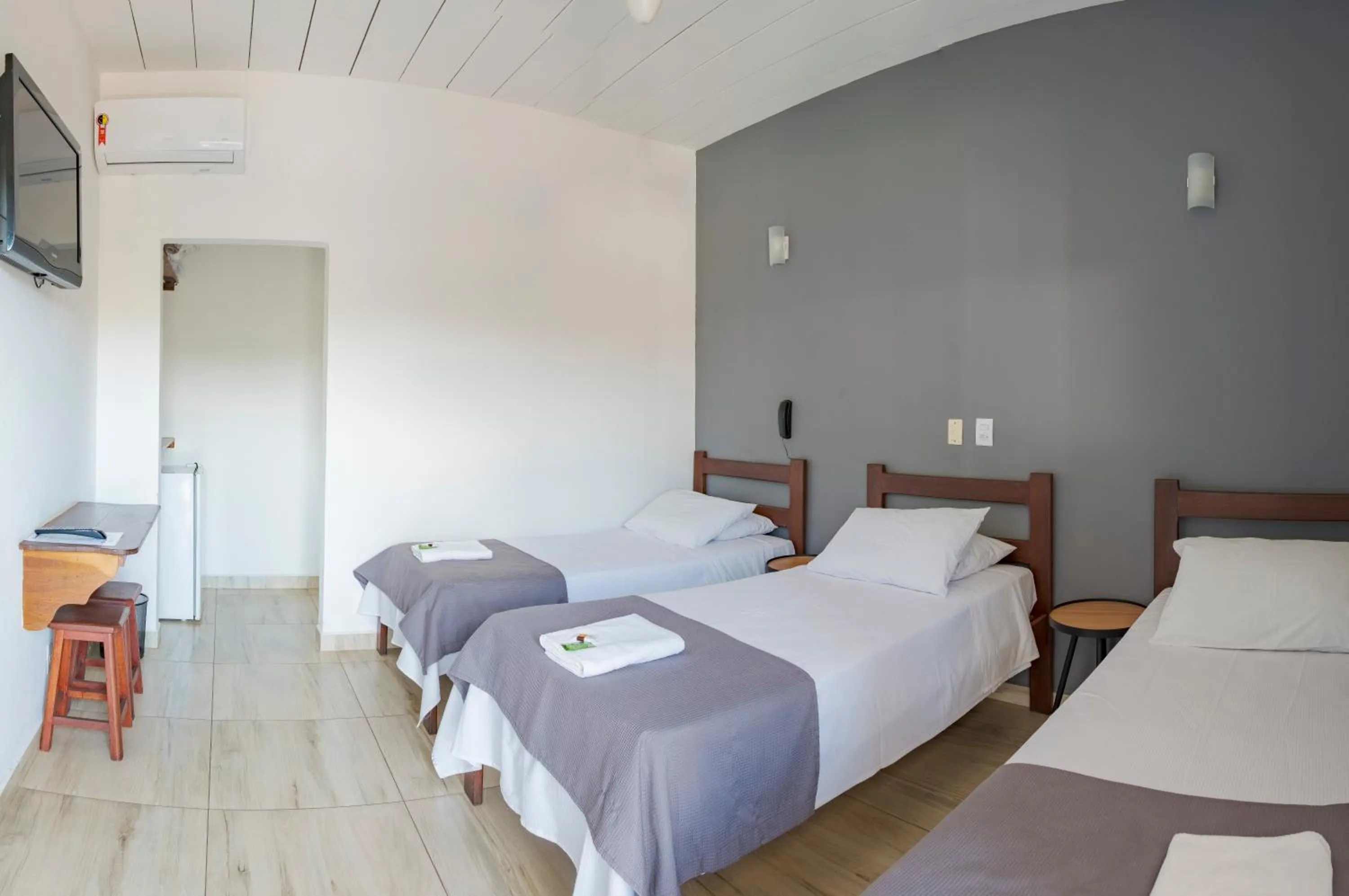 Bed in Pousada Dona Emilia