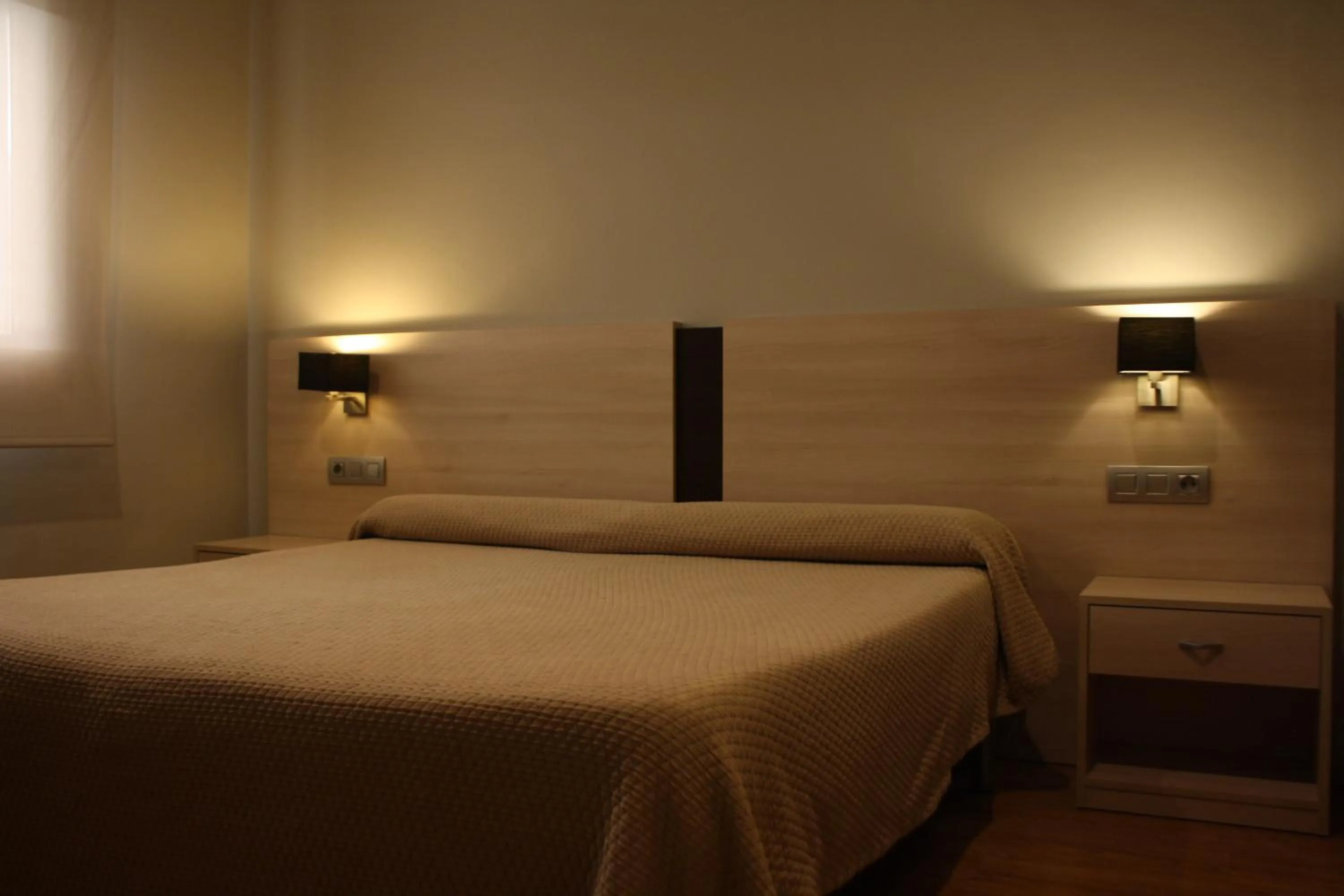 Bed in Hostal Crisami