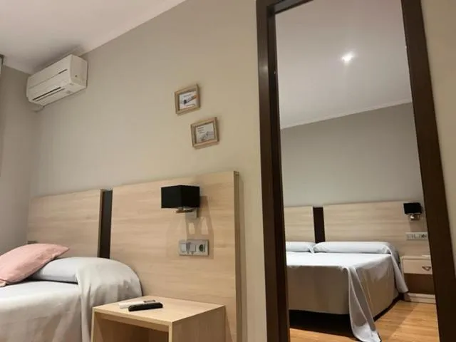 Bed in Hostal Crisami