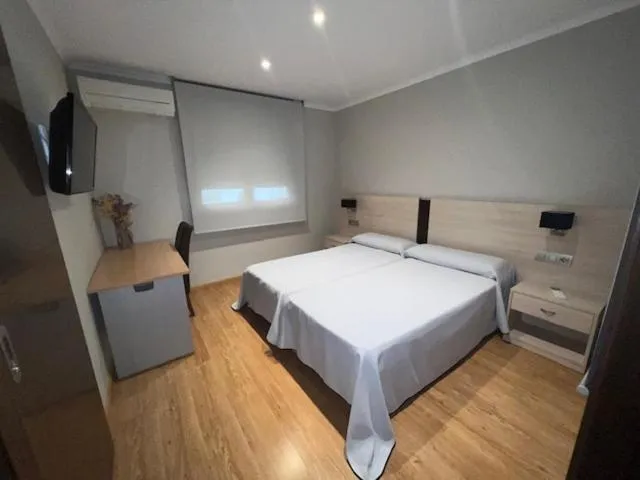 Bed in Hostal Crisami