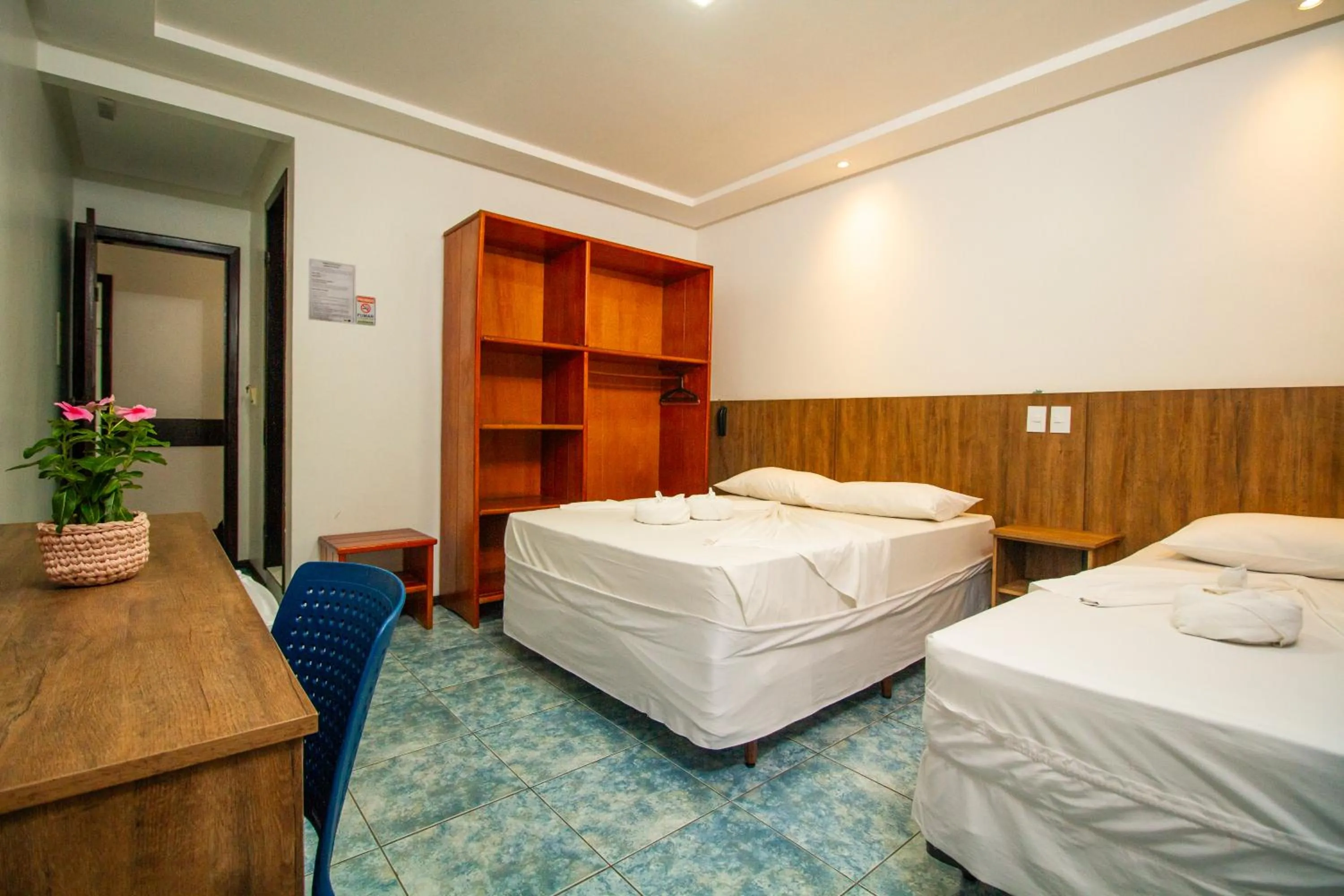 Bed in Hotel Bem Brasil