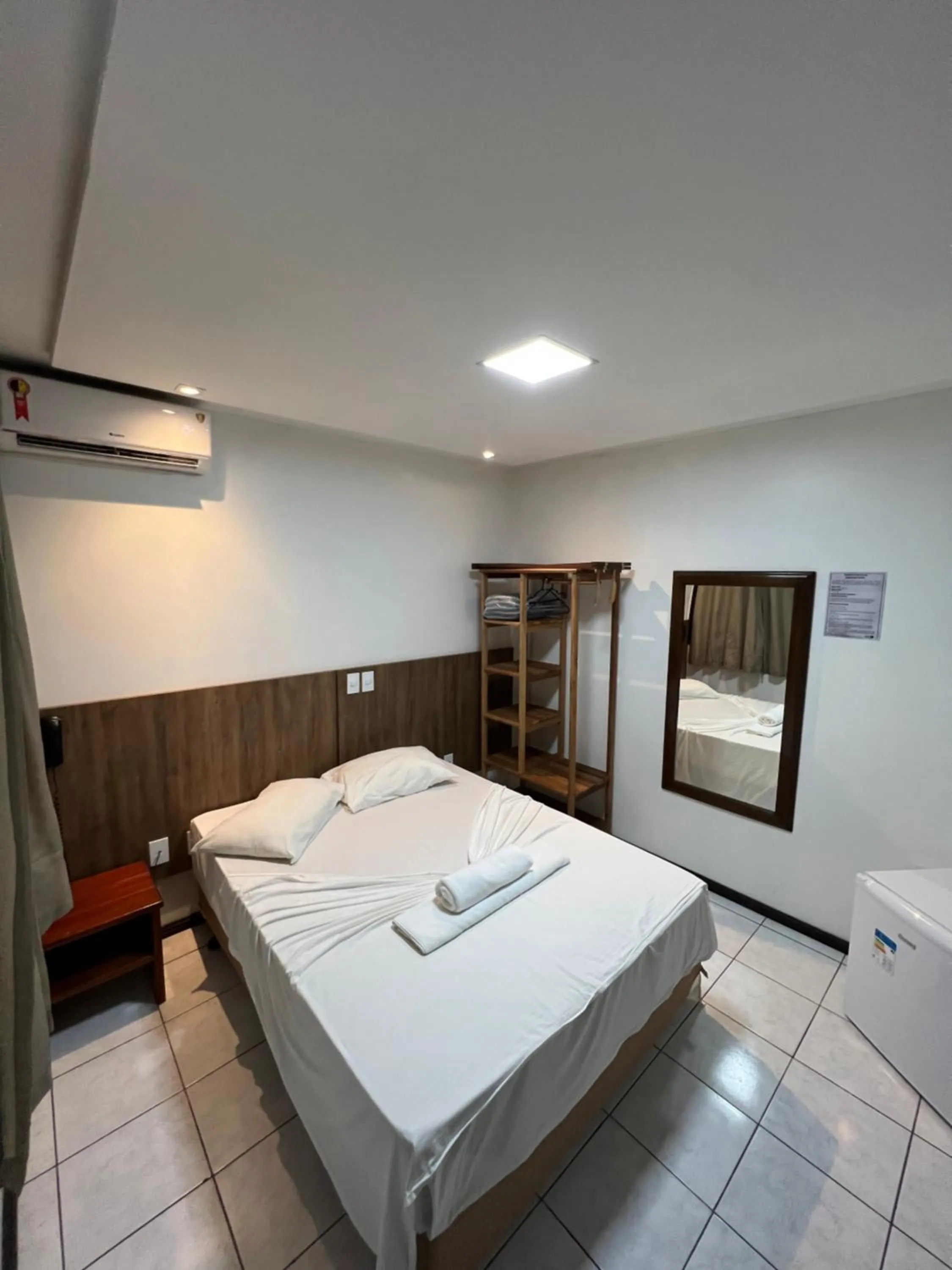 Bed in Hotel Bem Brasil