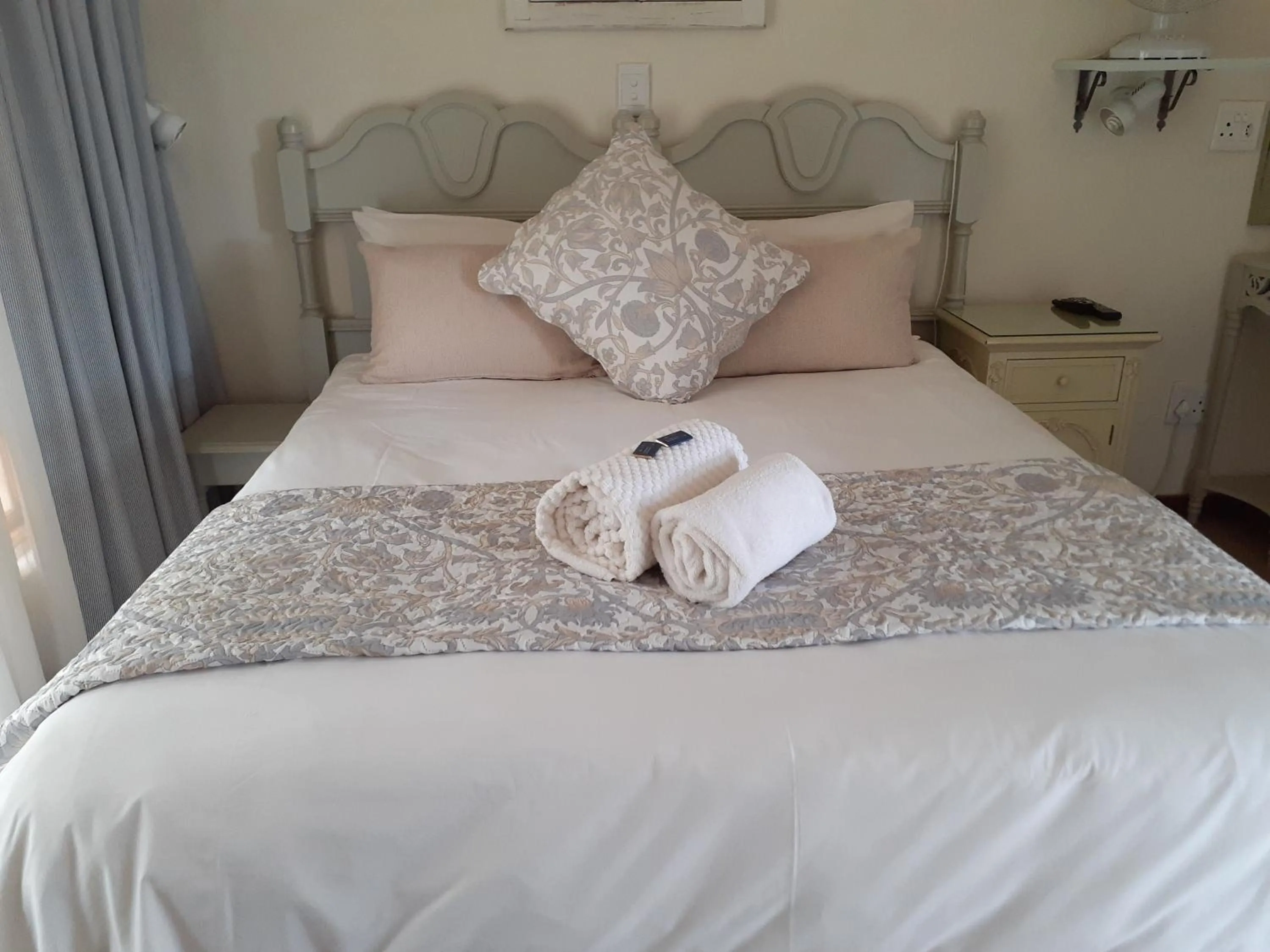 Bed in Sandstone Chameleon Guest House