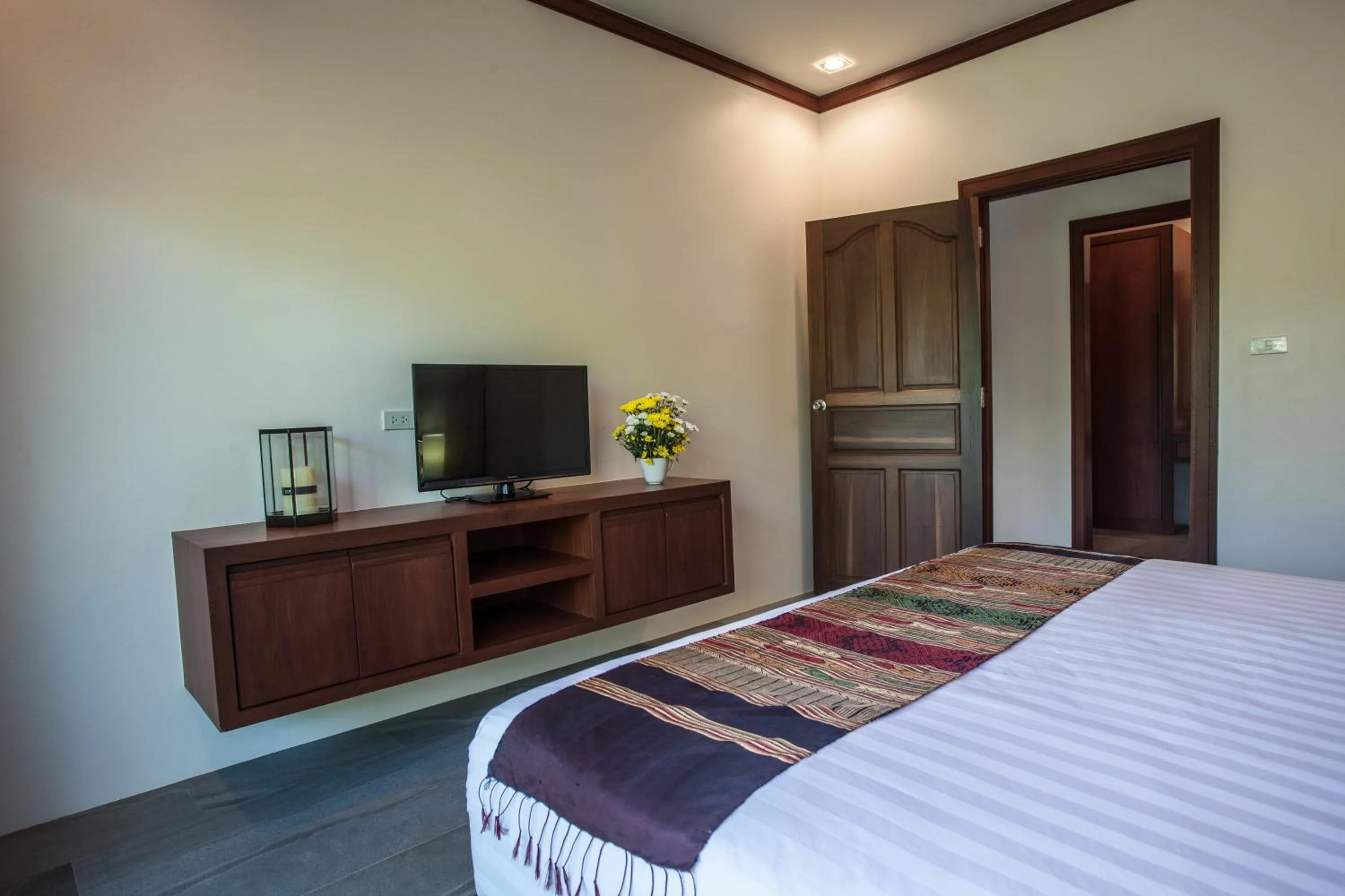 Bed in Baan Pinya Cosy One Bedroom Executive Bungalow
