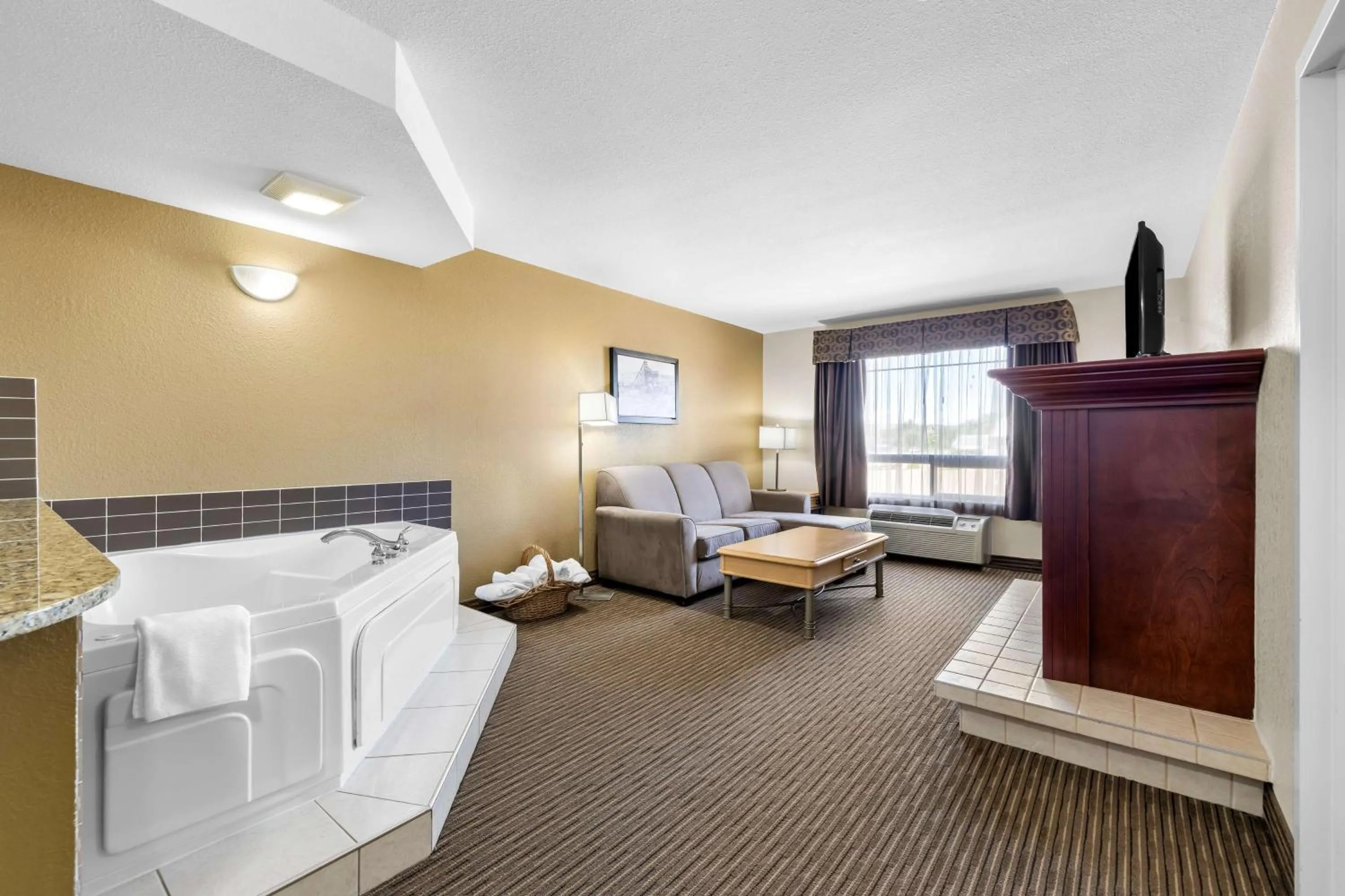 Bedroom, Bed in SureStay Plus Hotel by Best Western Drumheller