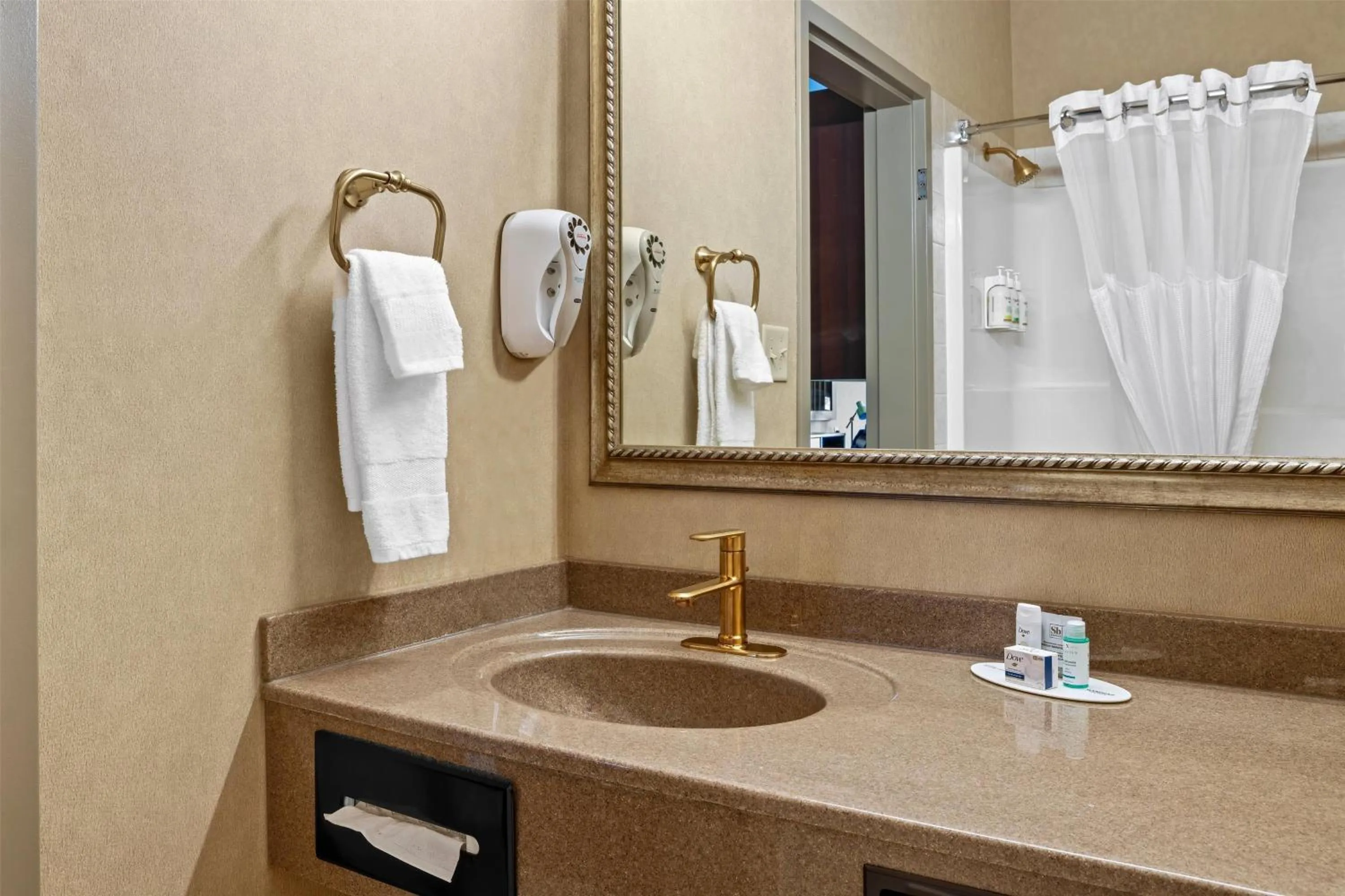 Bathroom in Ramada by Wyndham Drumheller Hotel & Suites