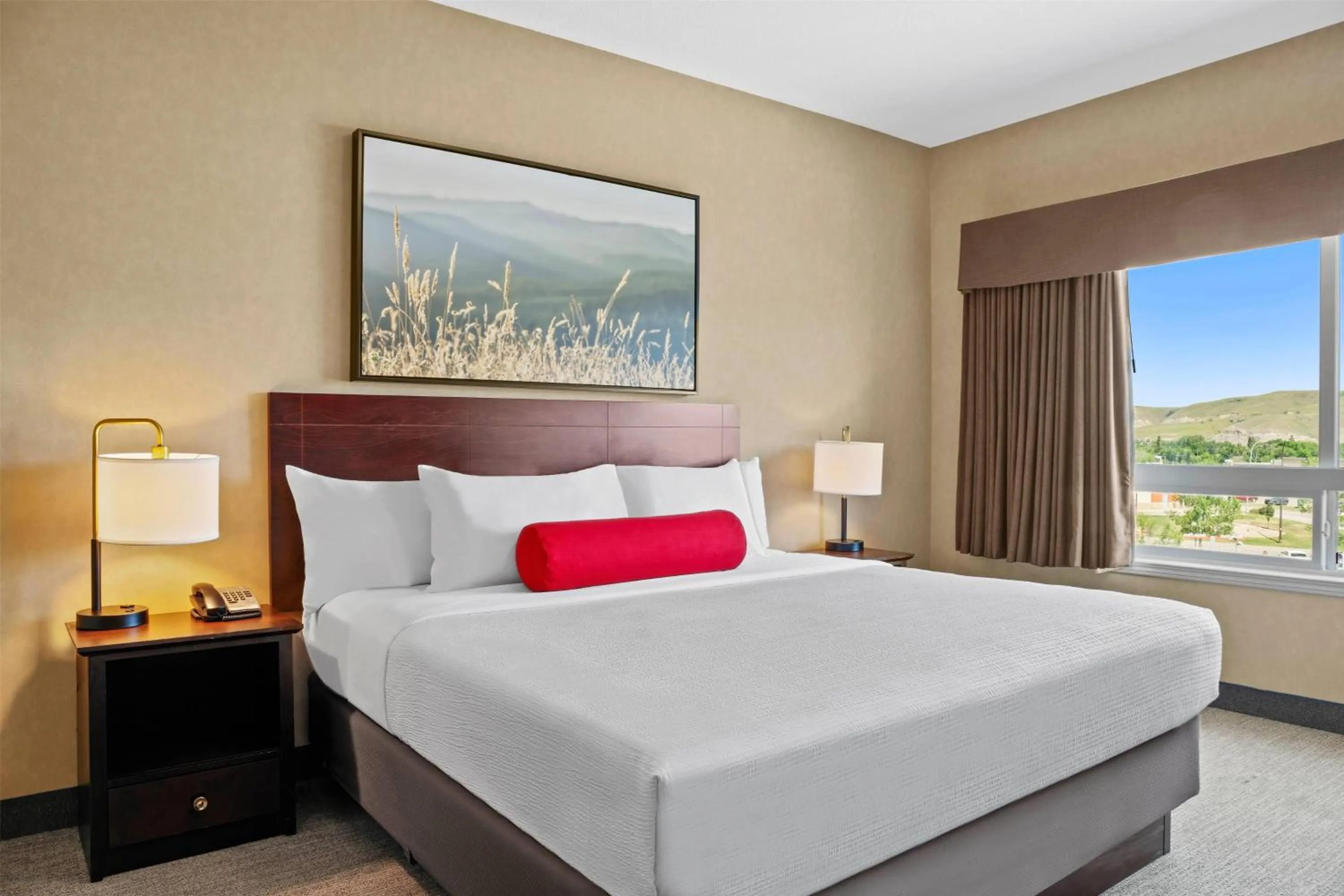 Photo of the whole room, Bed in Ramada by Wyndham Drumheller Hotel & Suites