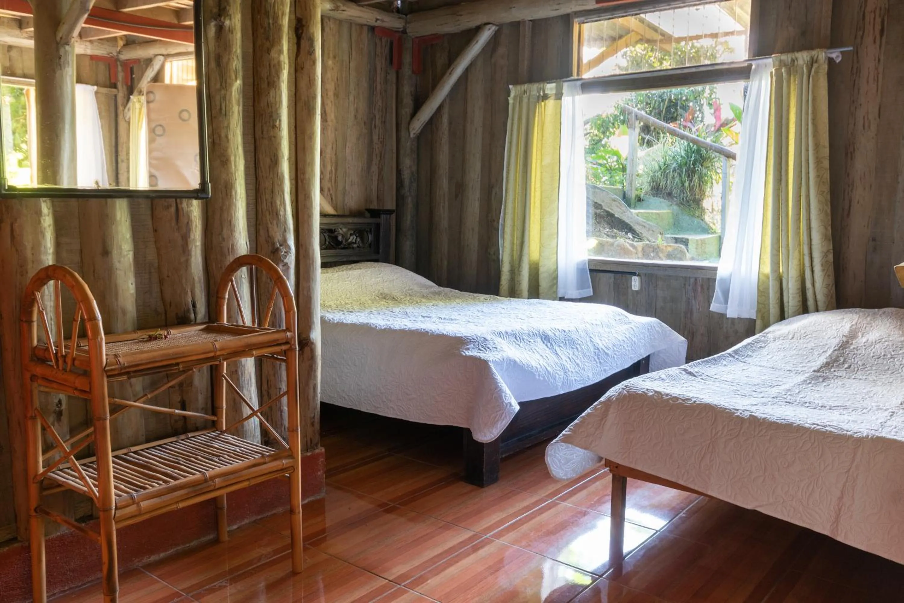Bed in Vista Turrialba Lodge