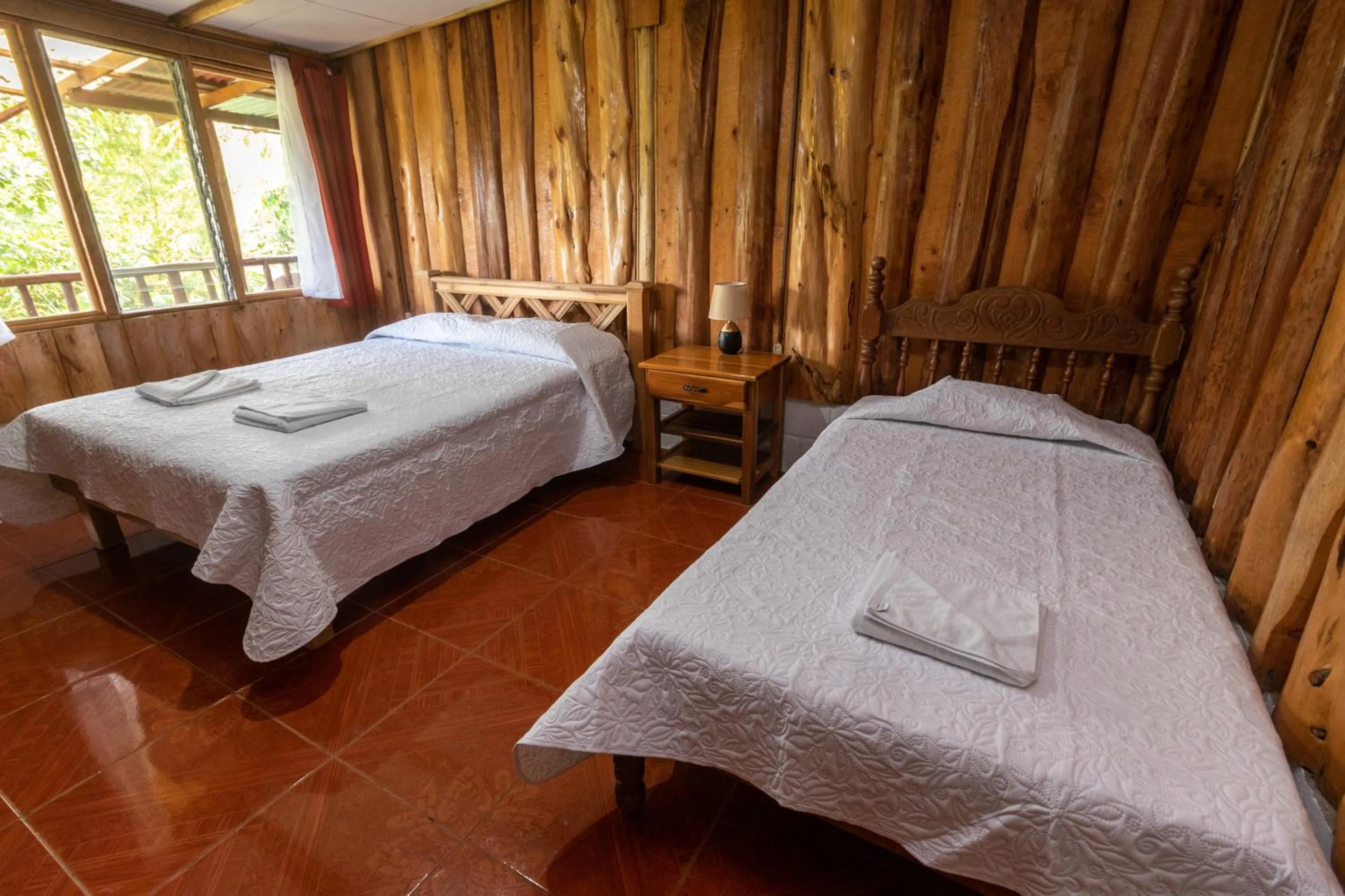 Bed in Vista Turrialba Lodge