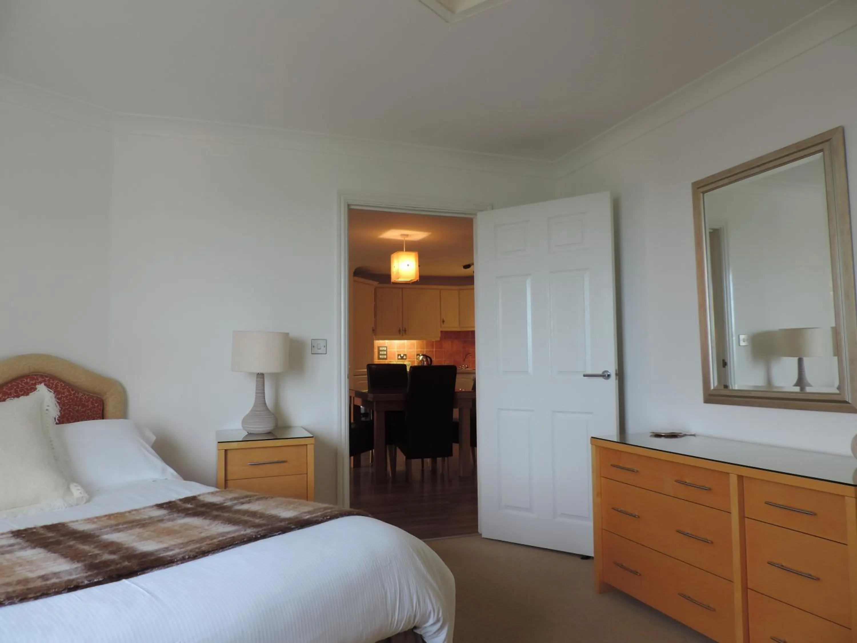 Bed in Sea Breeze Apartment