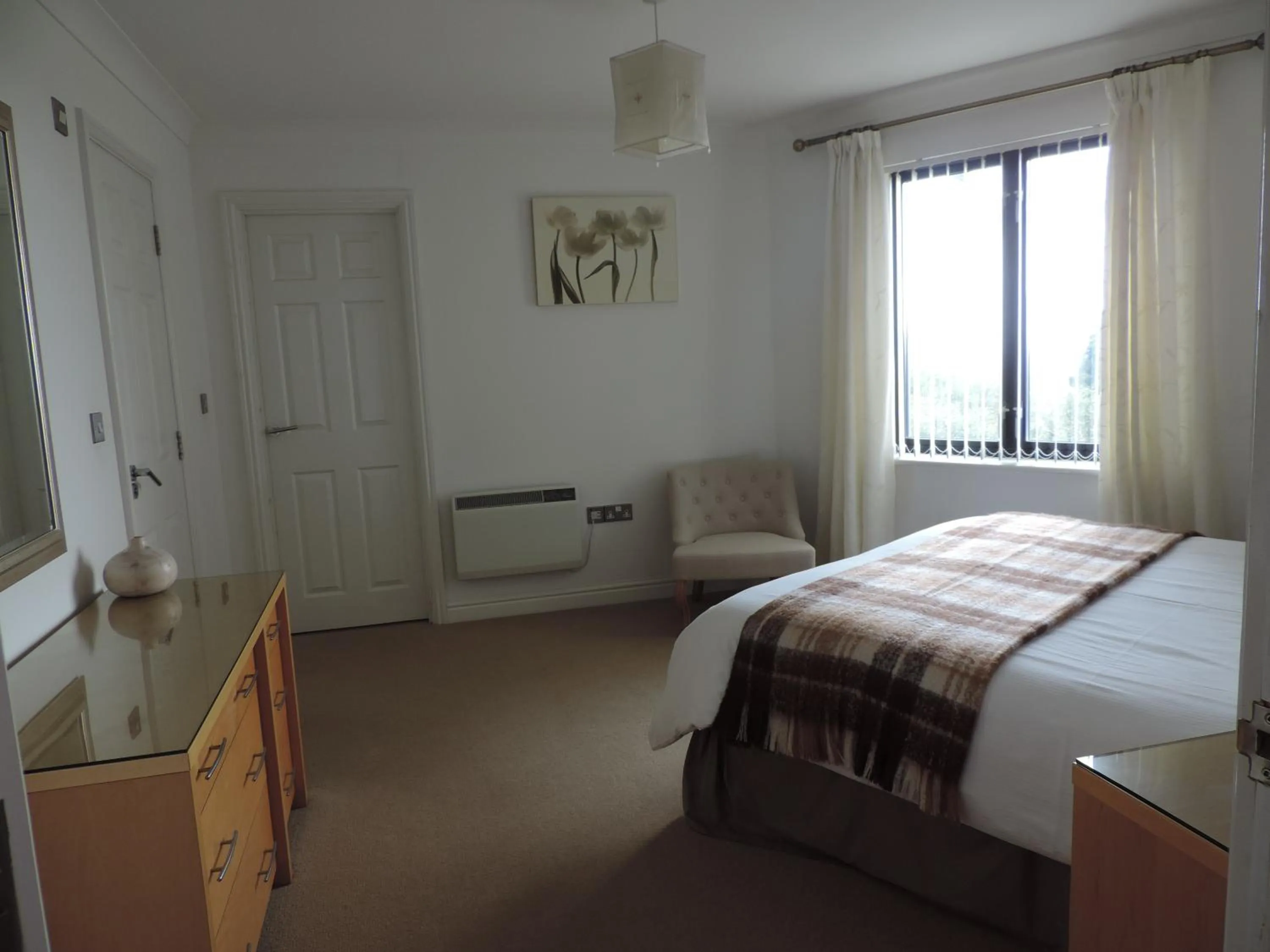 Bed in Sea Breeze Apartment