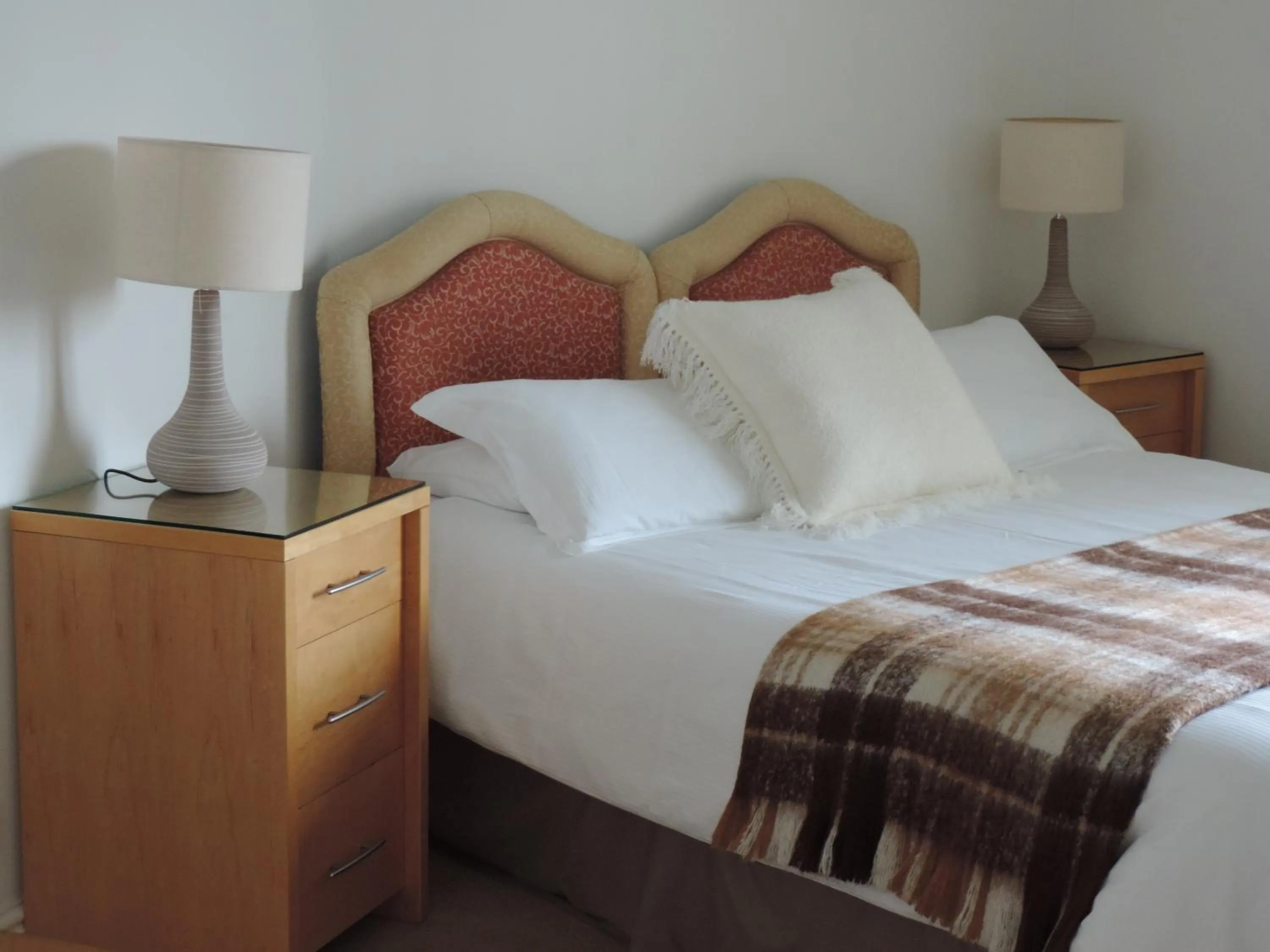 Bed in Sea Breeze Apartment