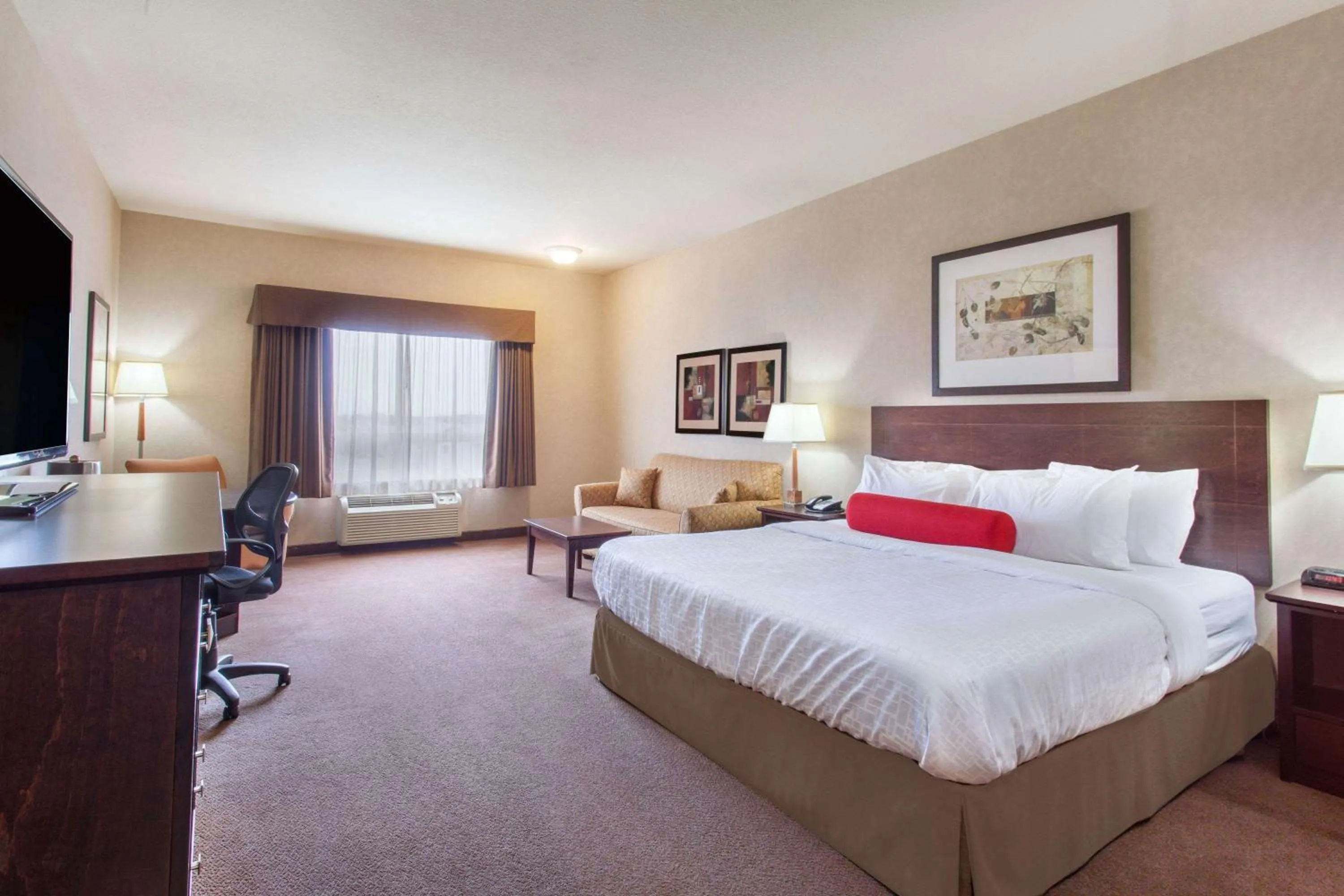 Photo of the whole room, Bed in Ramada by Wyndham Camrose