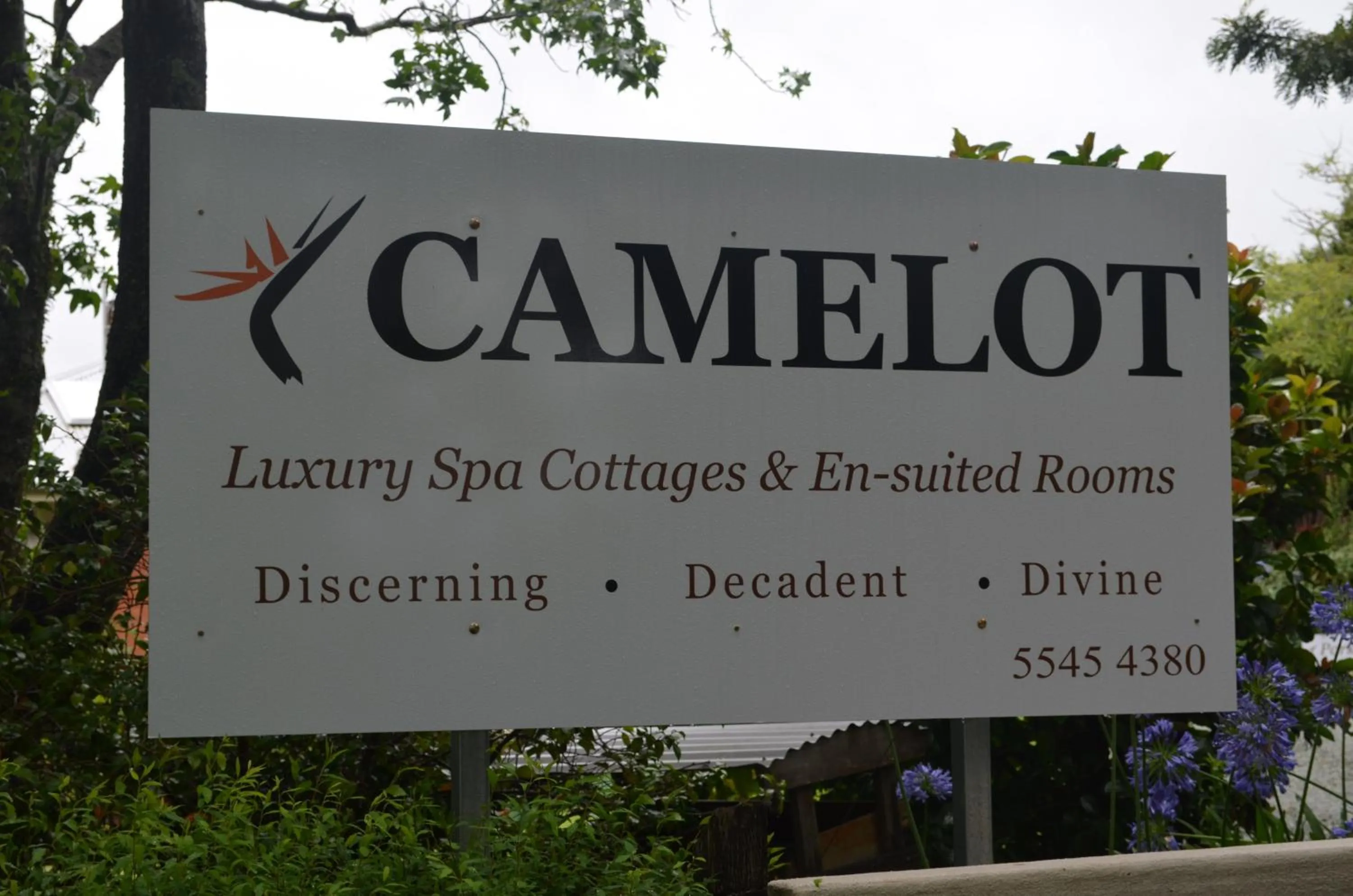 Property logo or sign in Camelot Boutique Accommodation