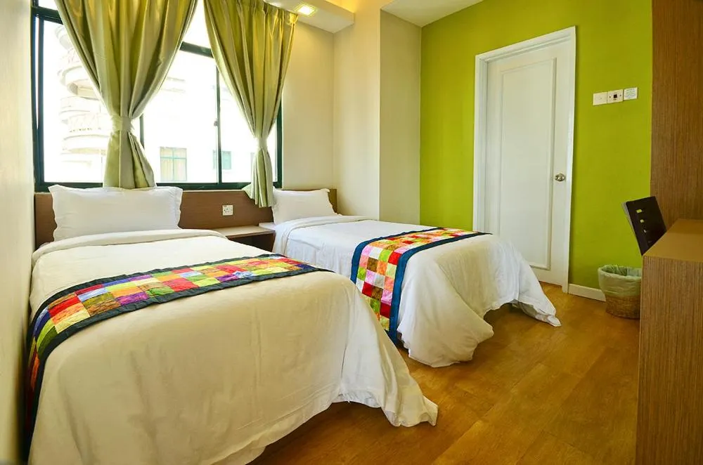 Bed in Jetty Suites Apartments