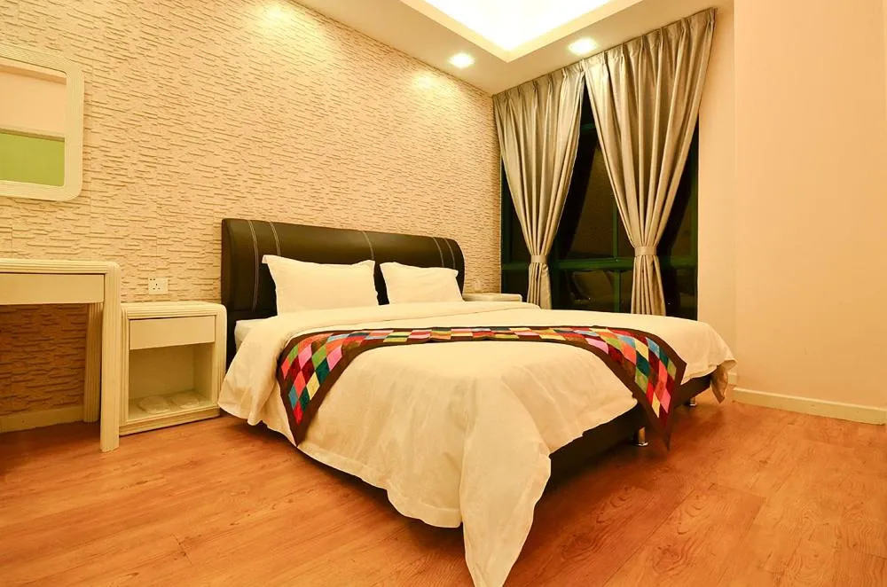 Bed in Jetty Suites Apartments