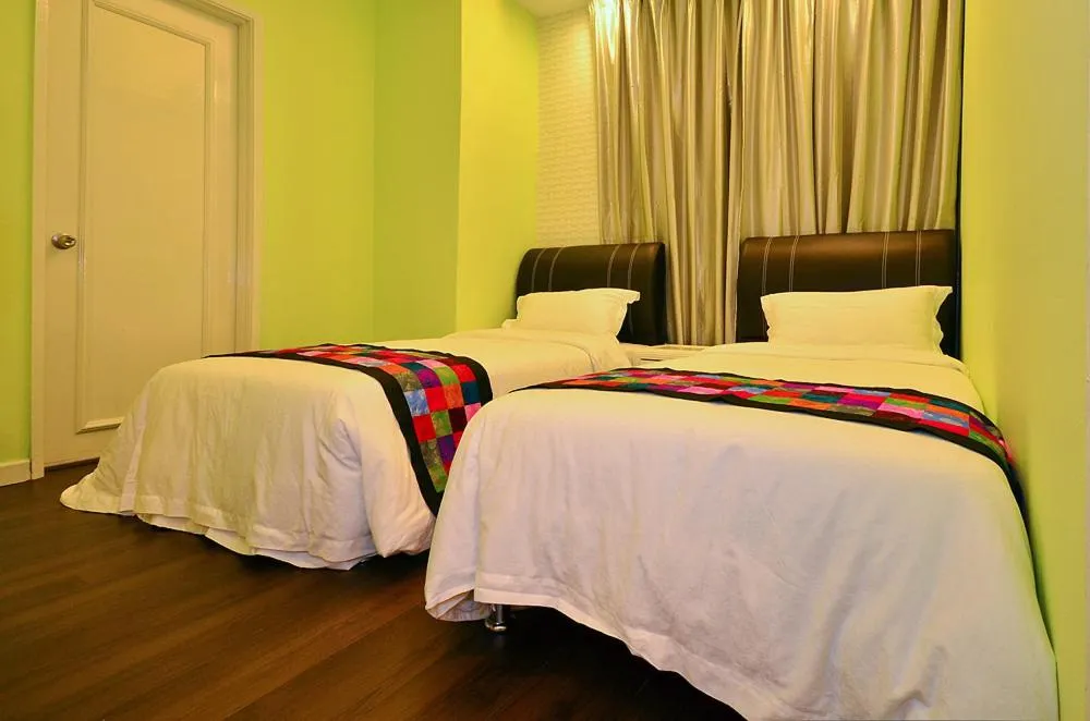 Bed in Jetty Suites Apartments
