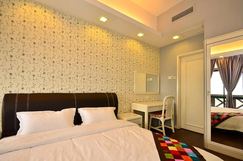 Bed in Jetty Suites Apartments