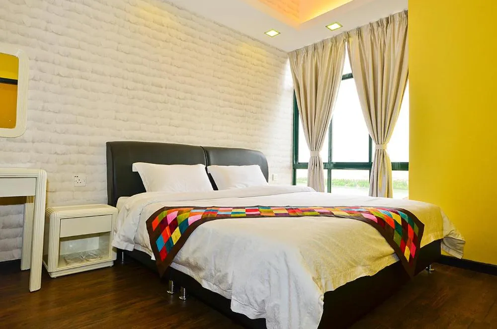 Bed in Jetty Suites Apartments