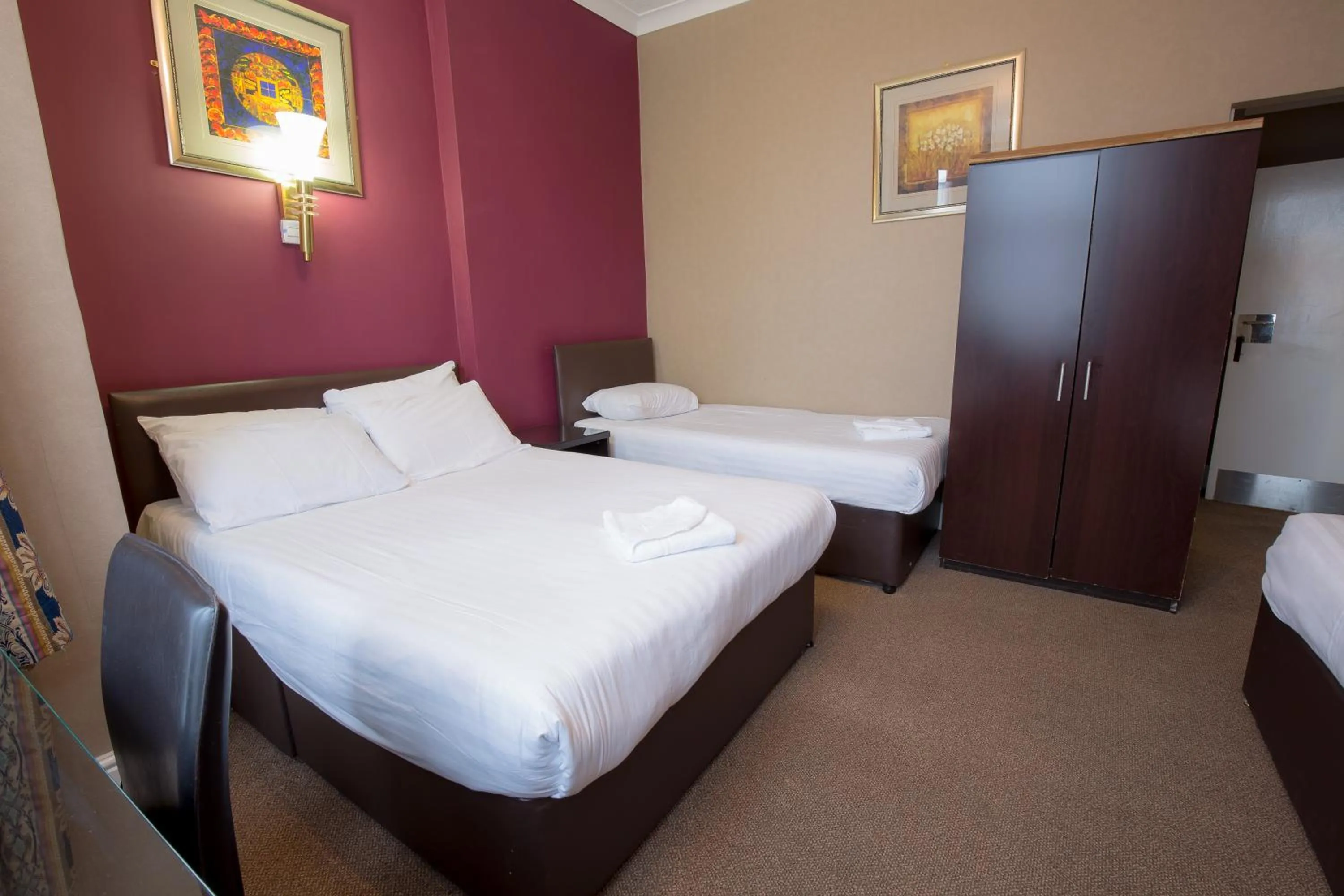 Bed in Rossmore Hotel